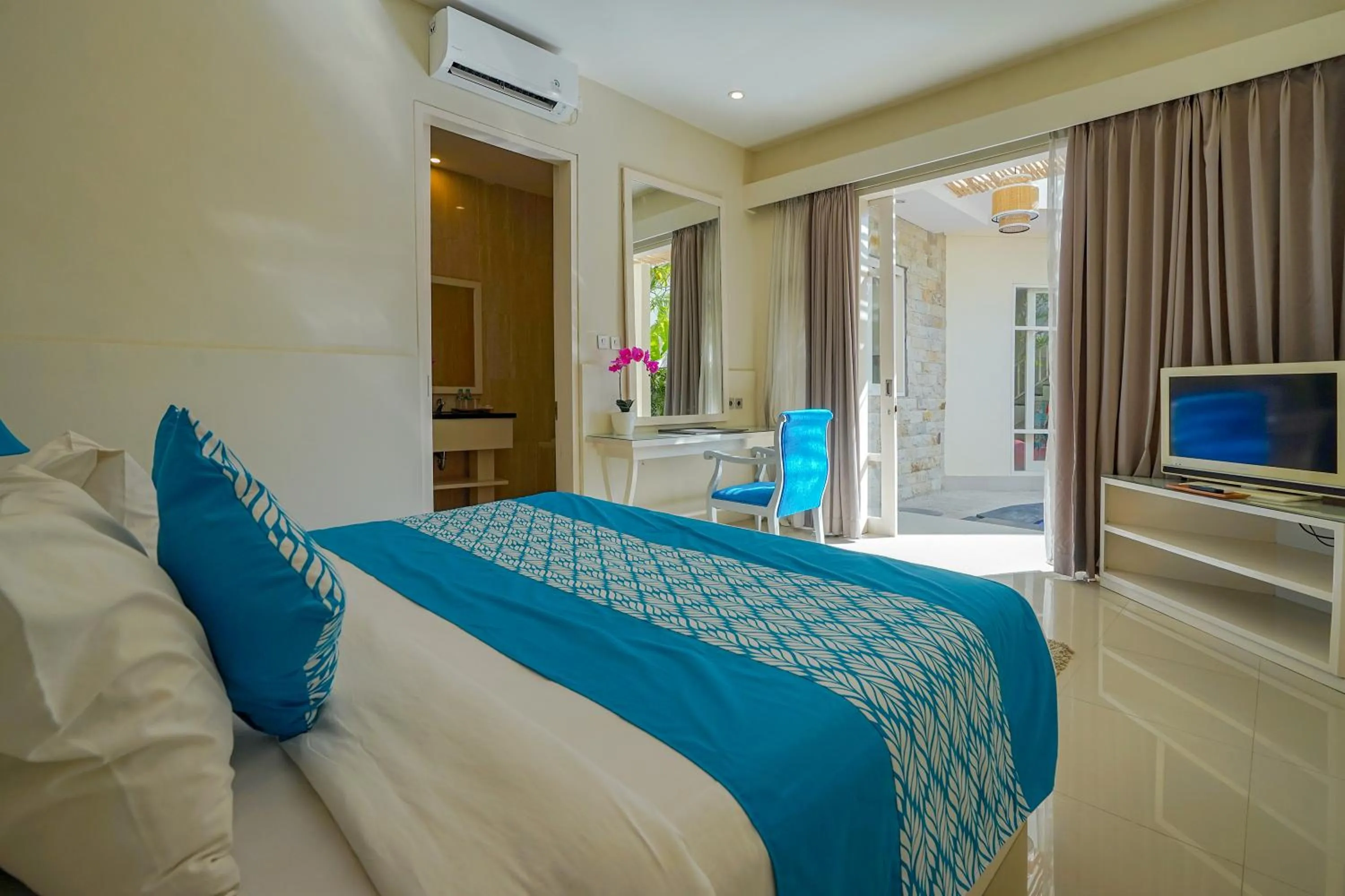 Bed in Awila Villas Kuta by The Wina Resorts