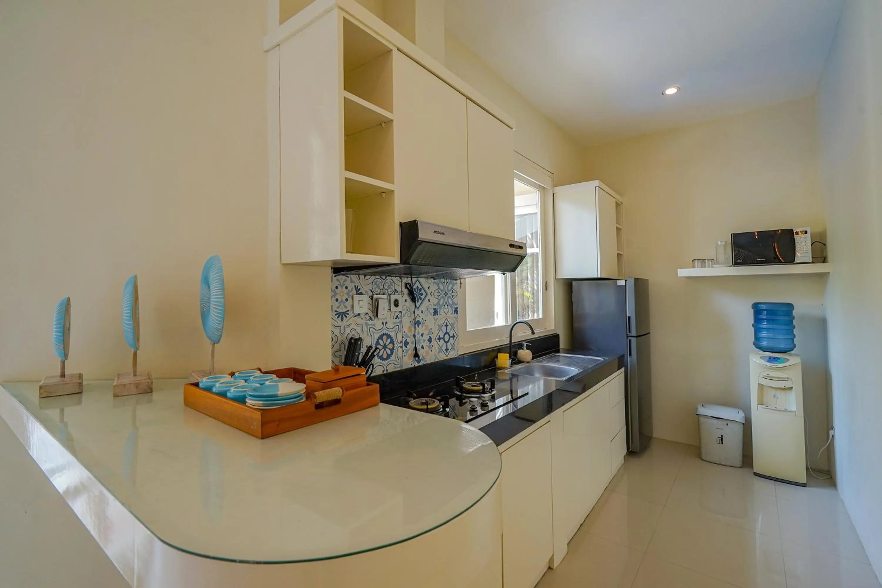 Kitchen or kitchenette in Awila Villas Kuta by The Wina Resorts