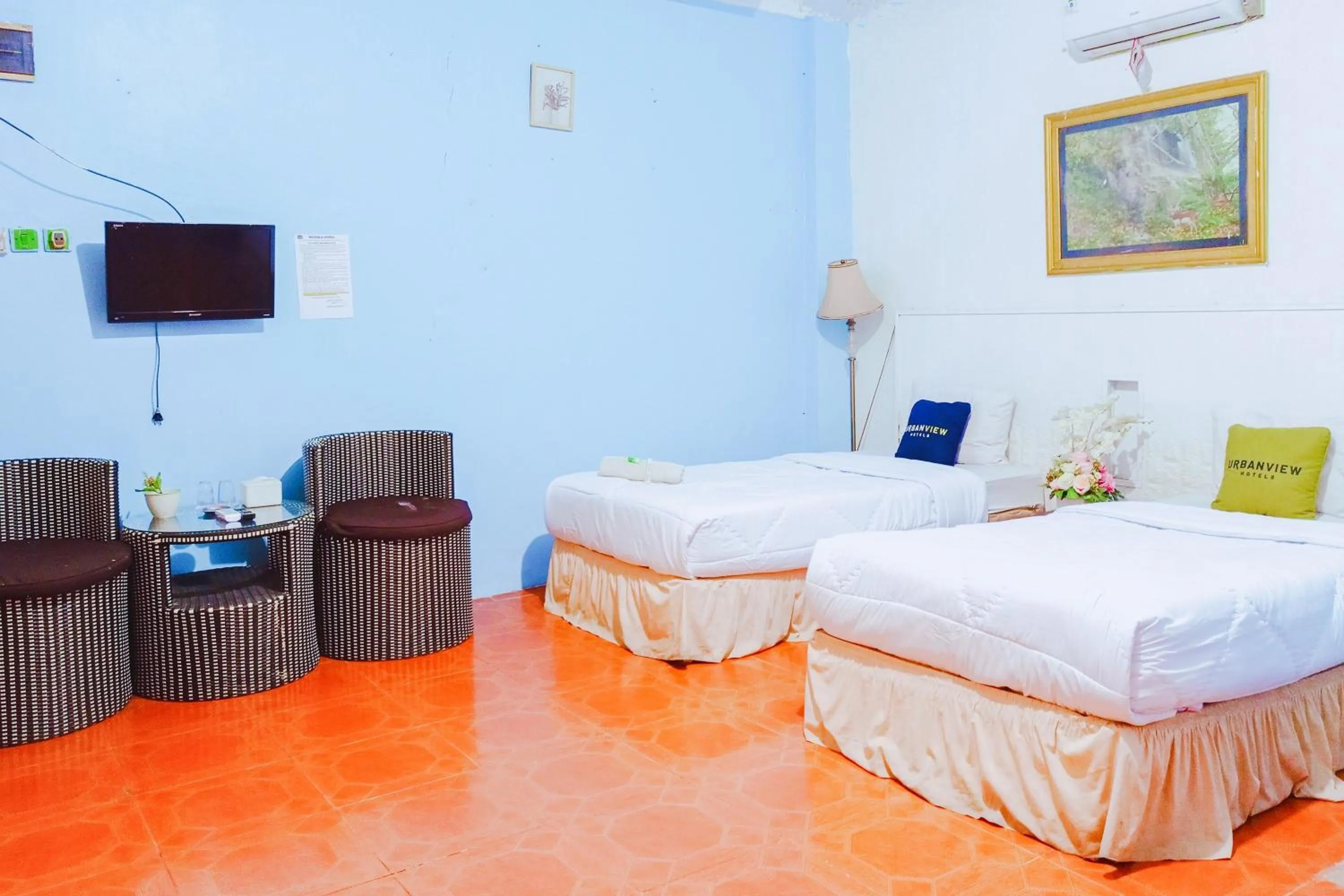 Bedroom, Bed in Urbanview at Wedika Hotel Bengkulu