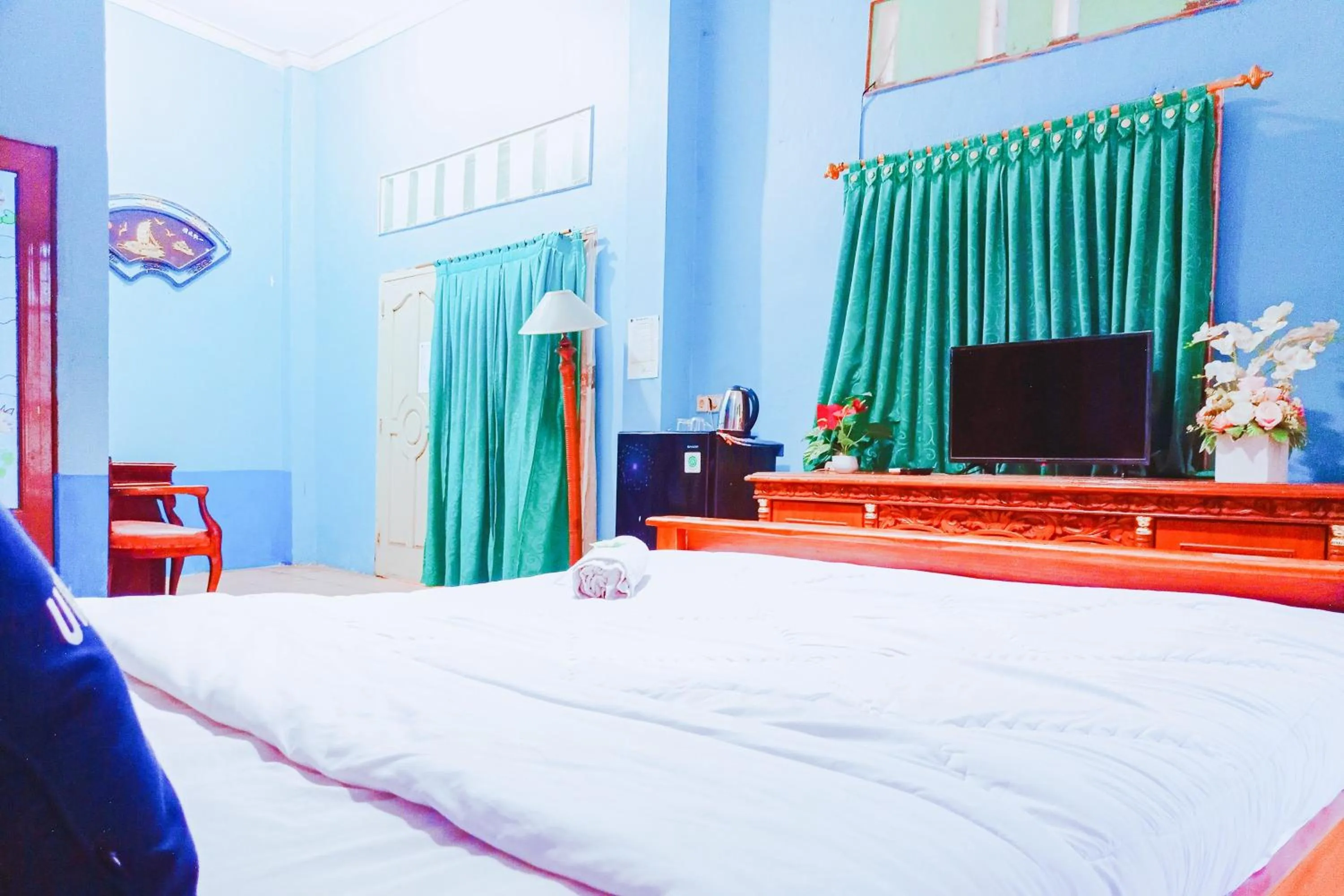 Bedroom, Bed in Urbanview at Wedika Hotel Bengkulu