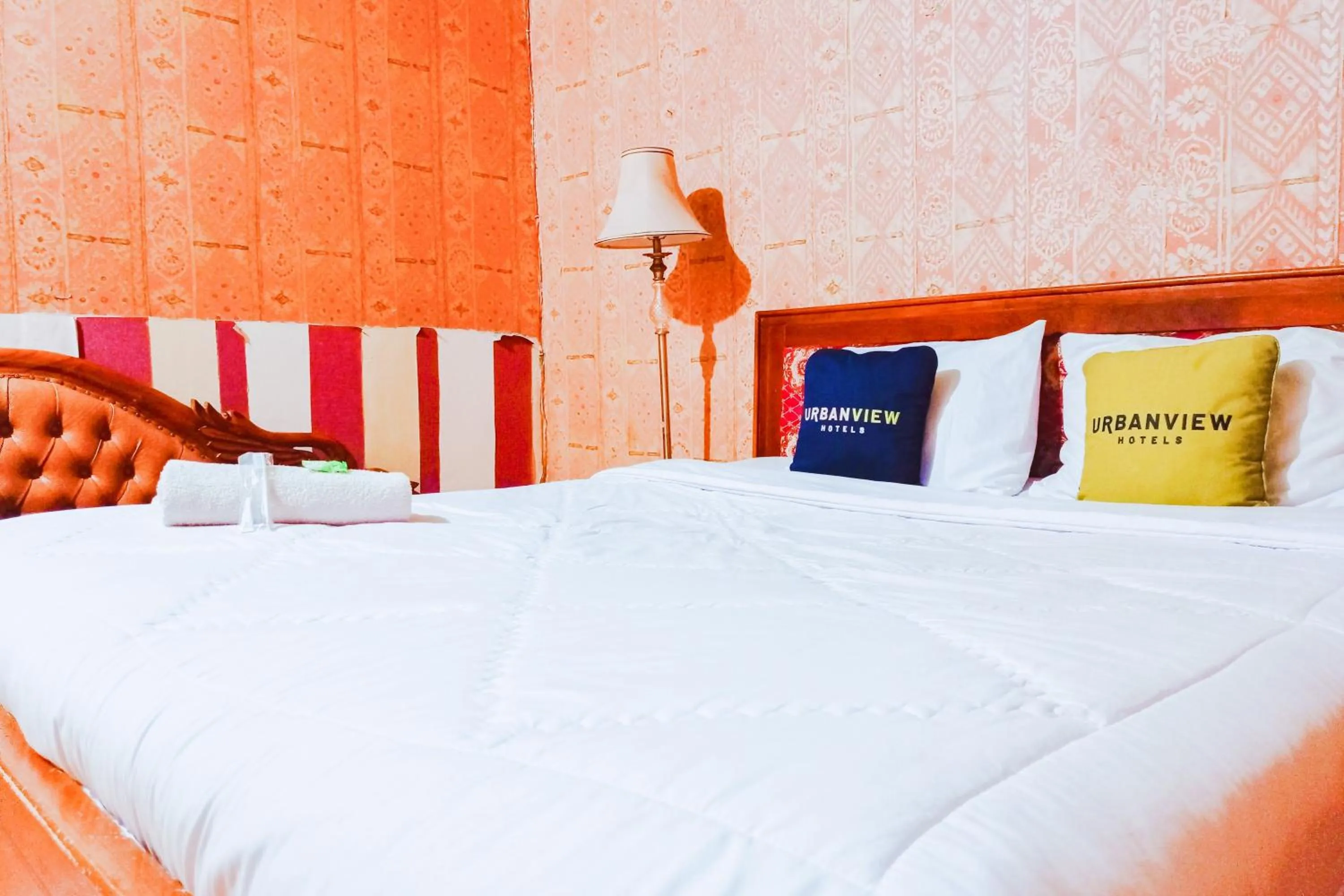 Bedroom, Bed in Urbanview at Wedika Hotel Bengkulu