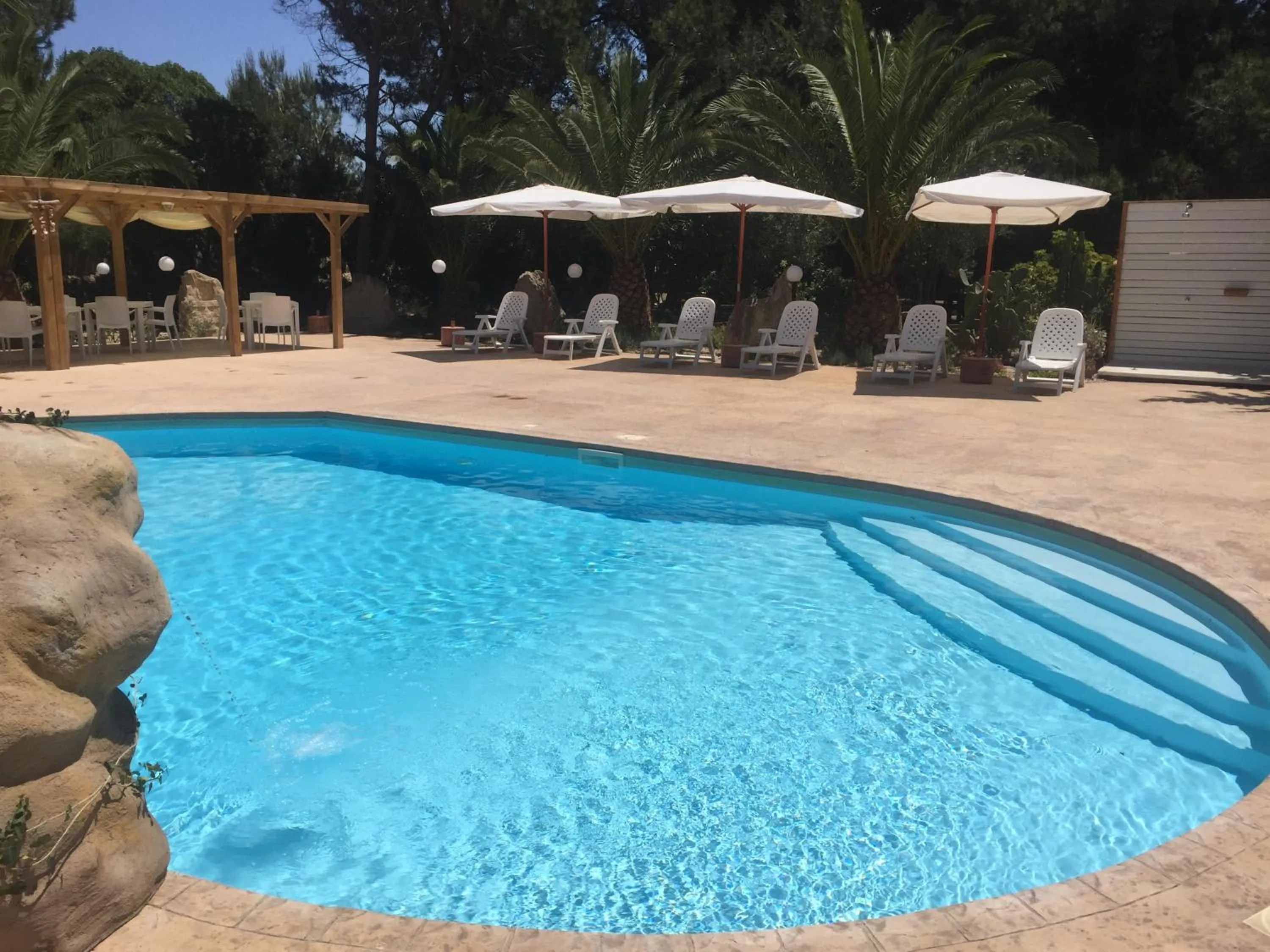 Swimming pool in Albergo Residenziale Menhirs