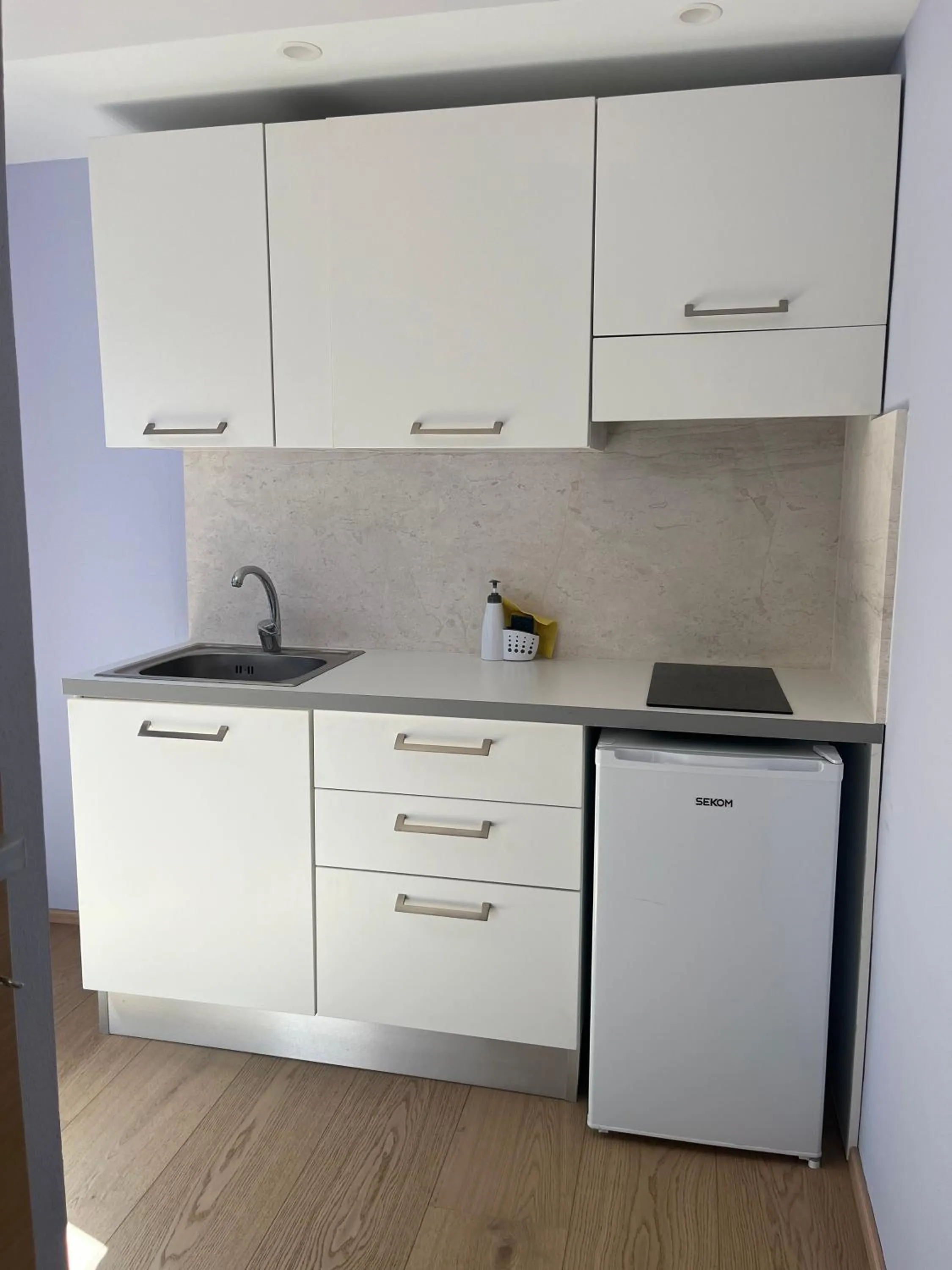 Kitchen or kitchenette in Albergo Residenziale Menhirs