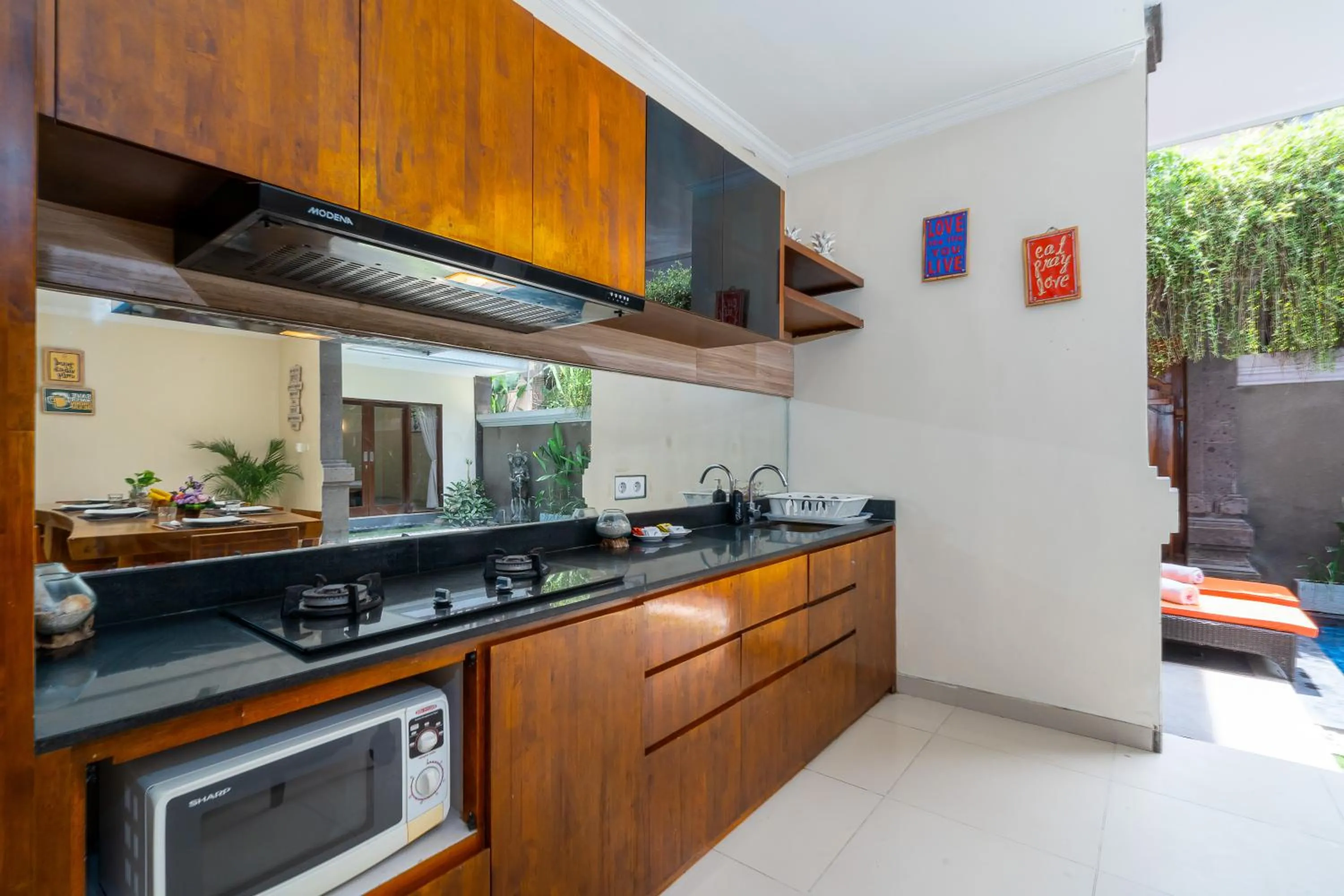 Kitchen or kitchenette in De' Bharata Bali Villas