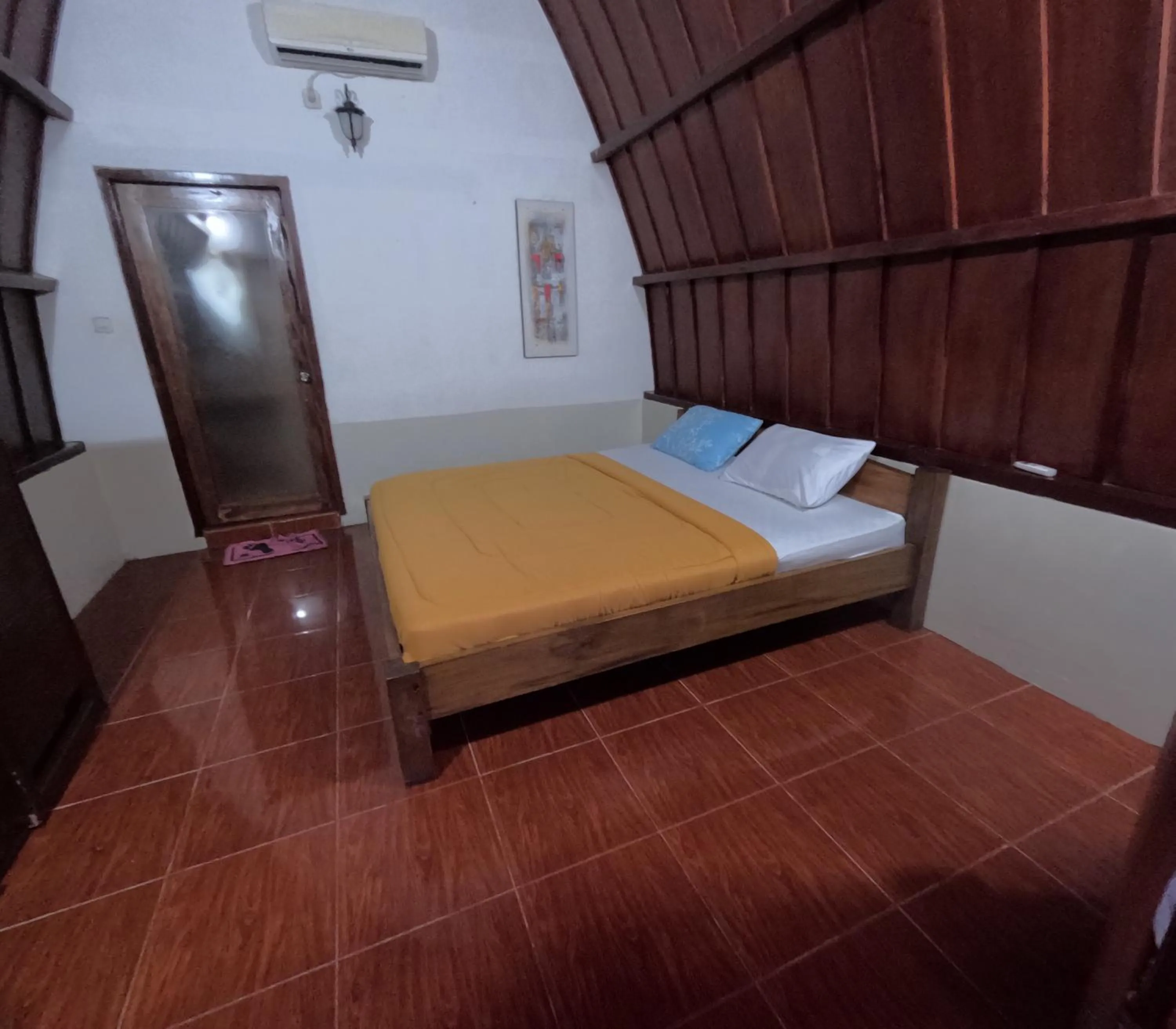Bed in Banana Leaf Bungalow