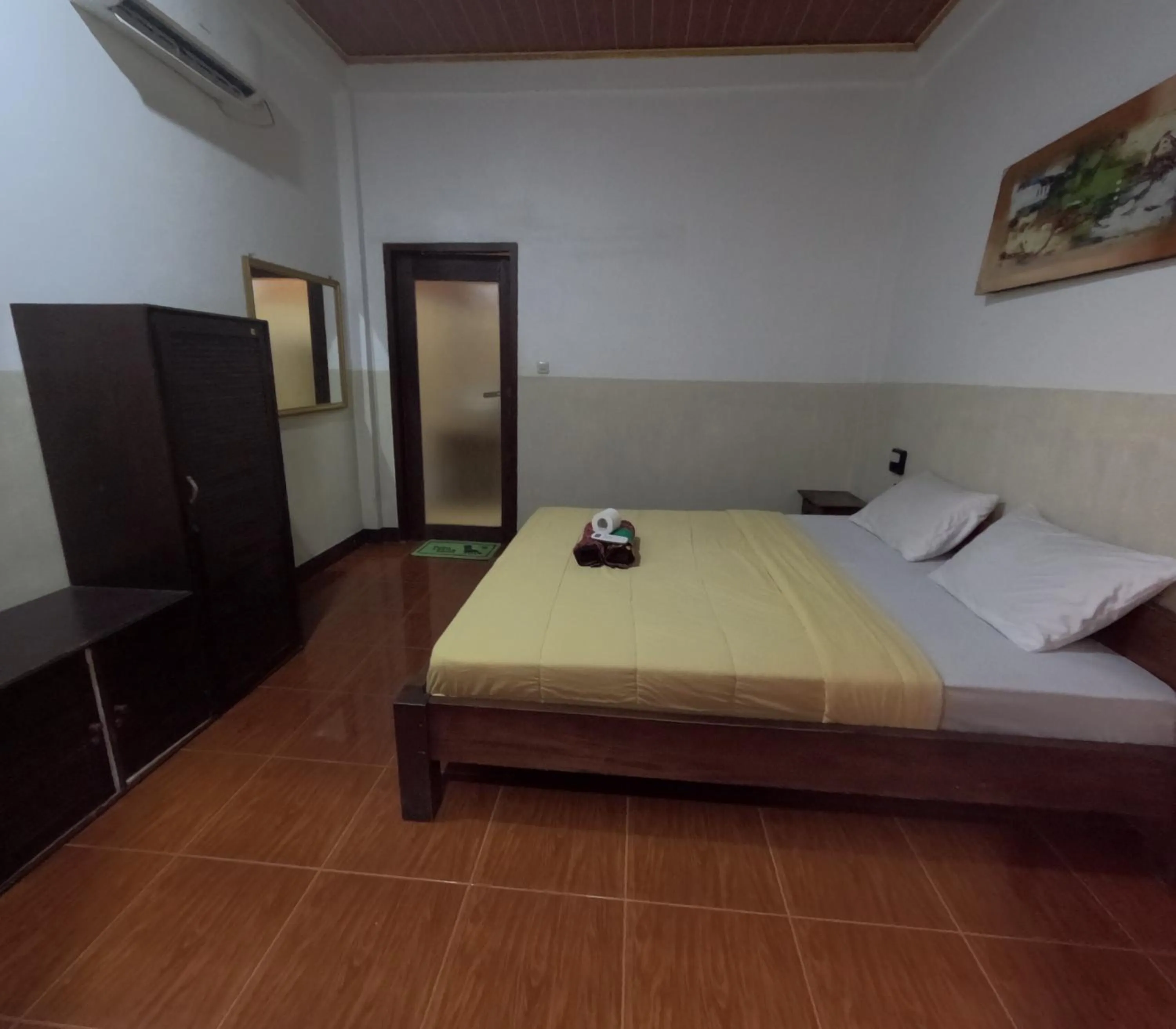 Bed in Banana Leaf Bungalow