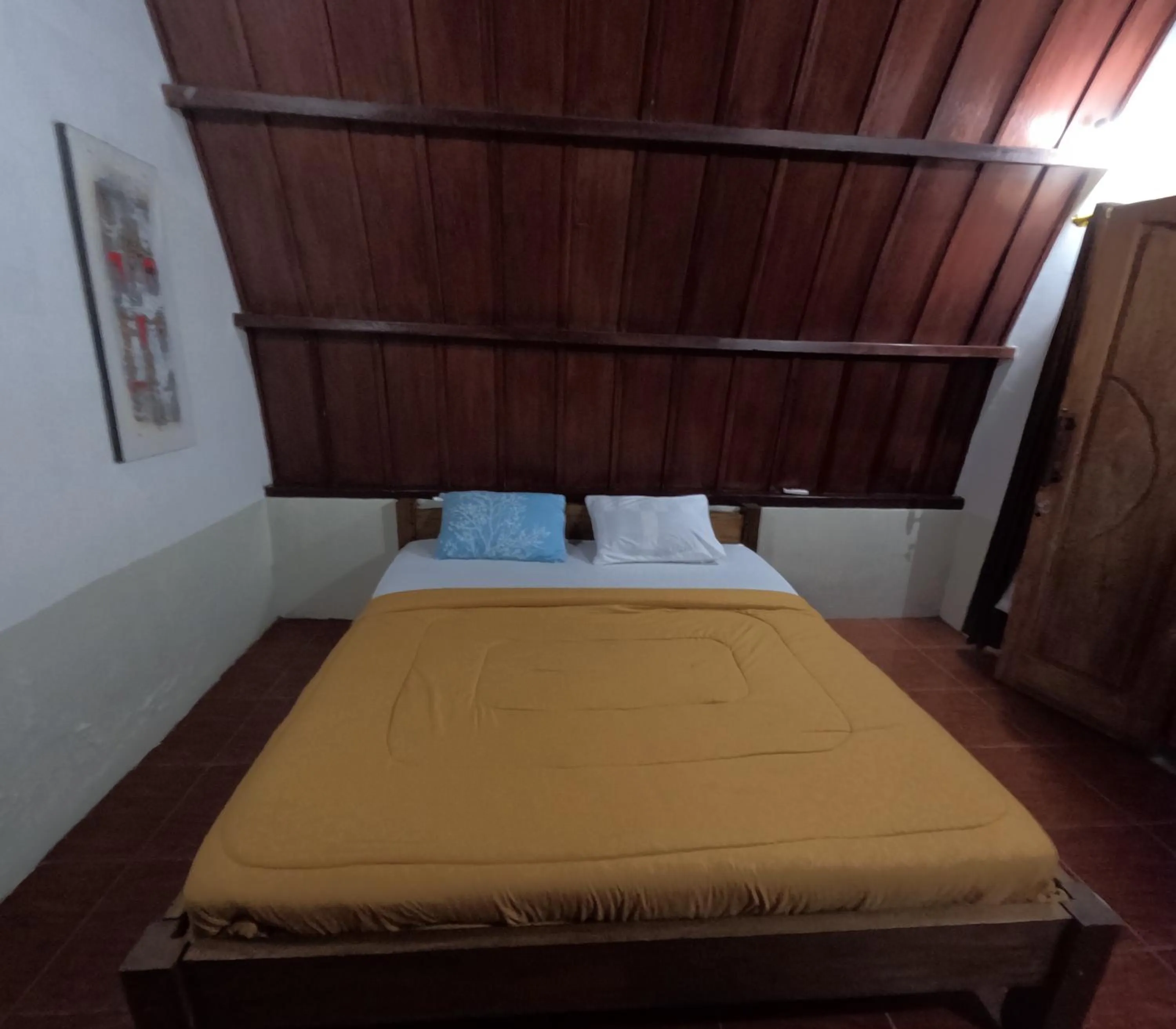 Bed in Banana Leaf Bungalow