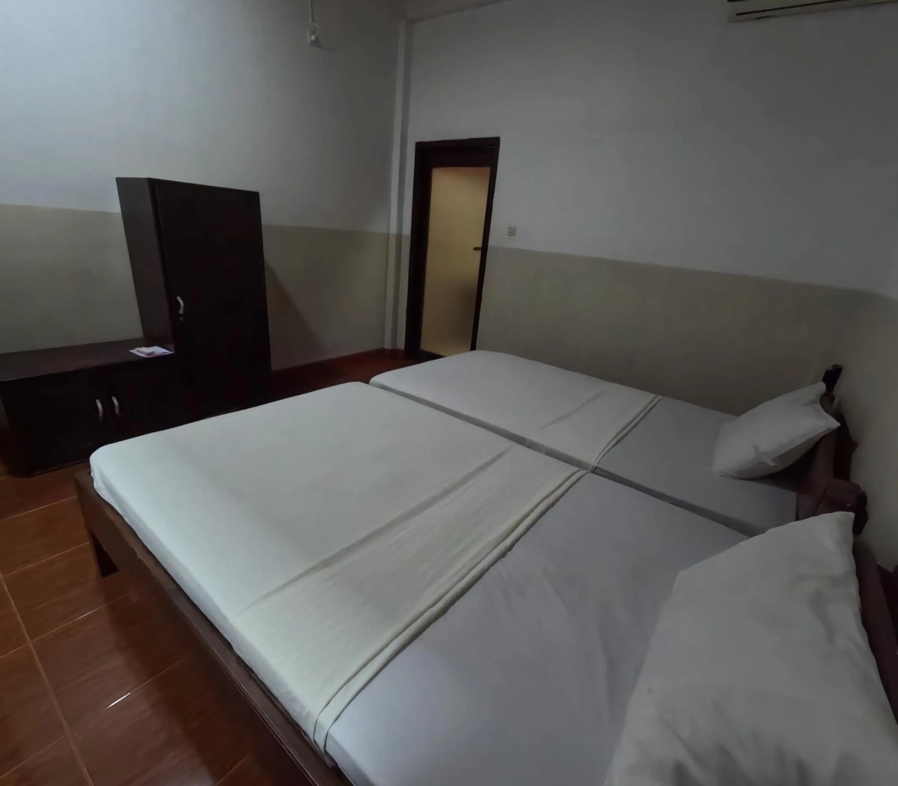 Bed in Banana Leaf Bungalow