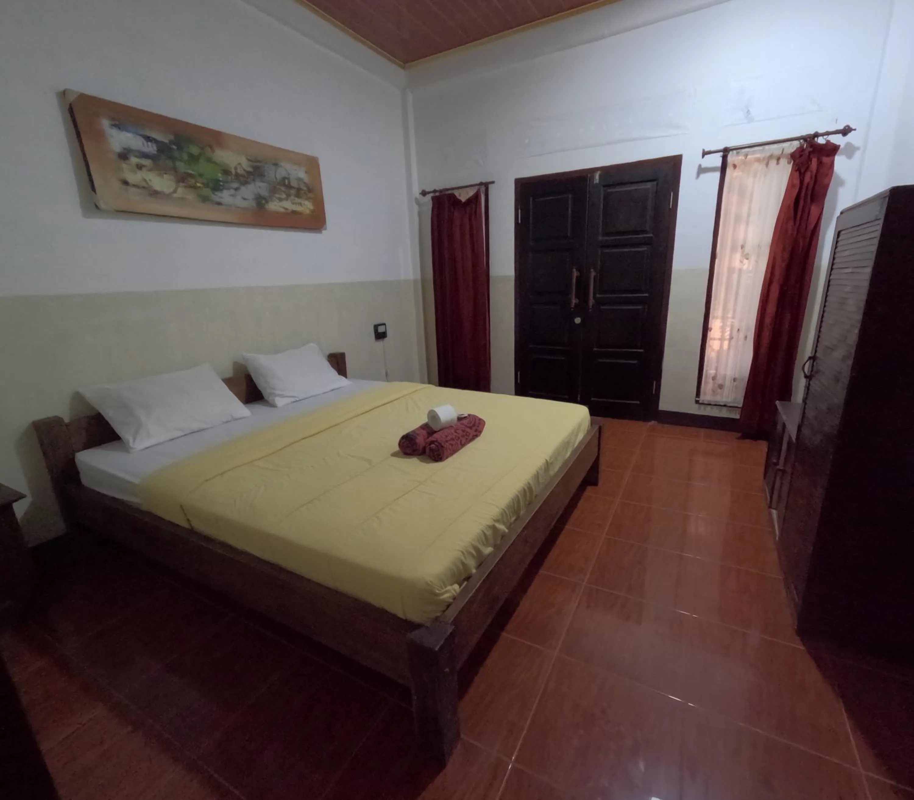 Bed in Banana Leaf Bungalow