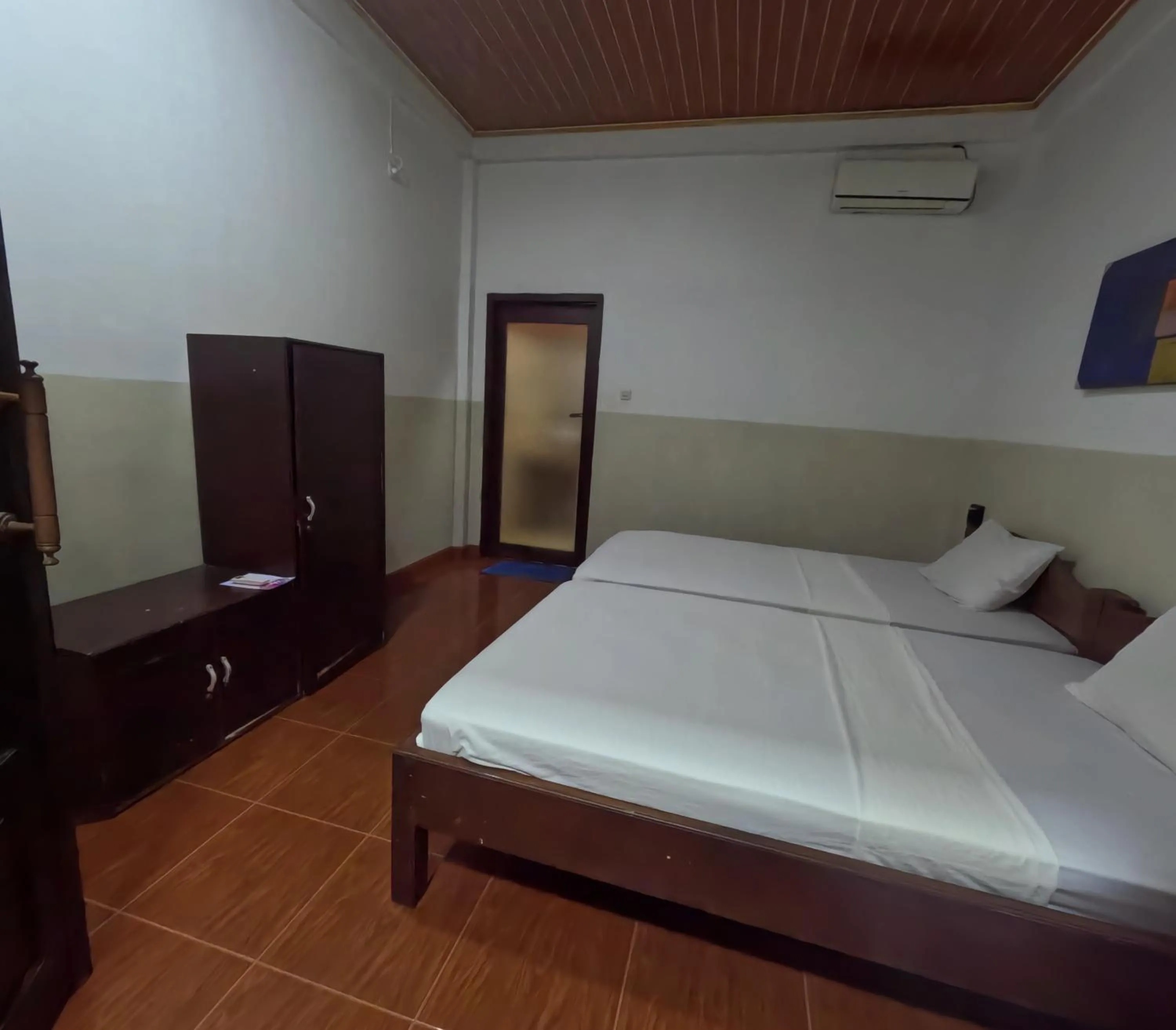 Bed in Banana Leaf Bungalow