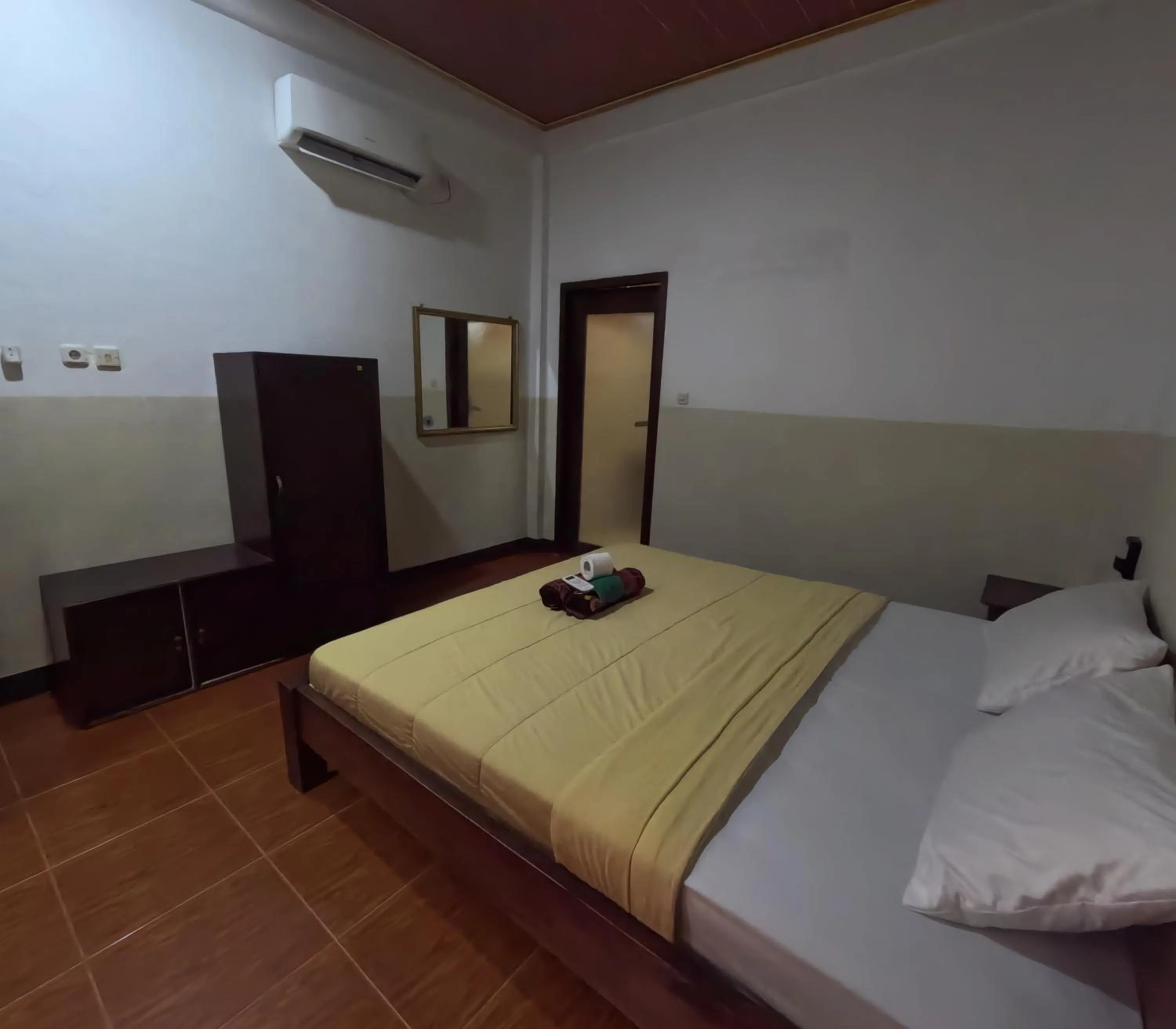 Bed in Banana Leaf Bungalow