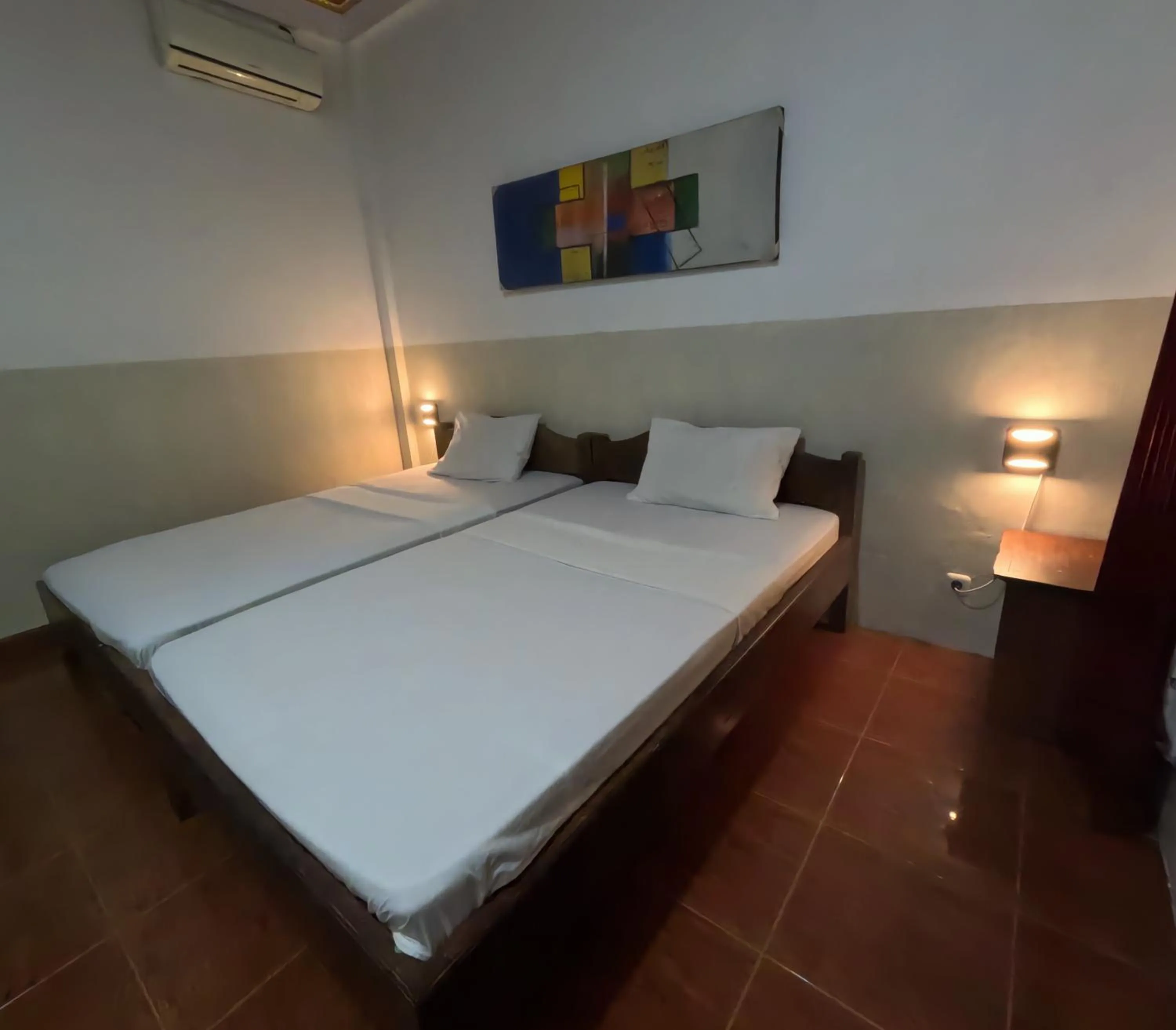 Bed in Banana Leaf Bungalow