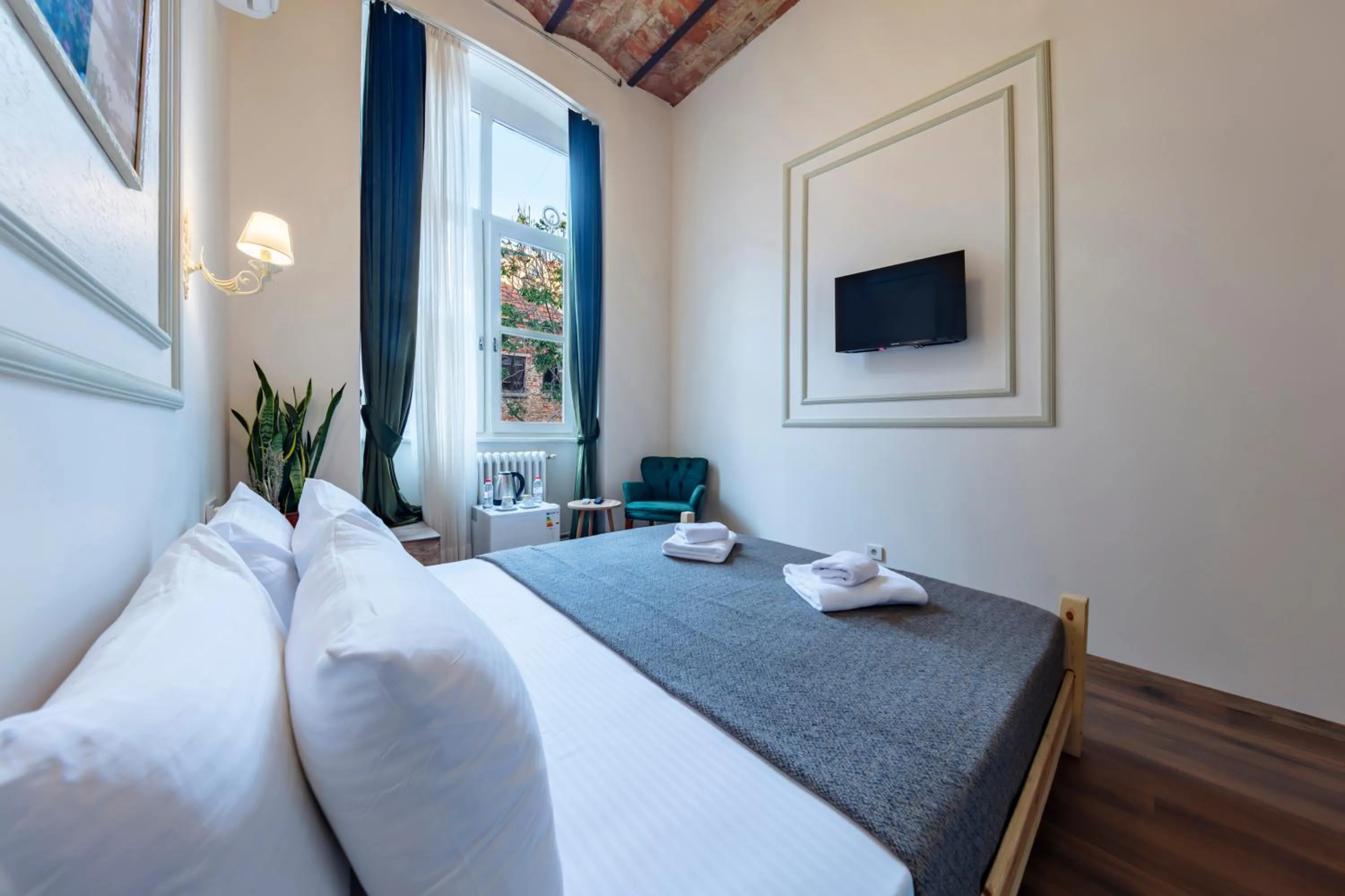 Bed in Cezayir Rooms