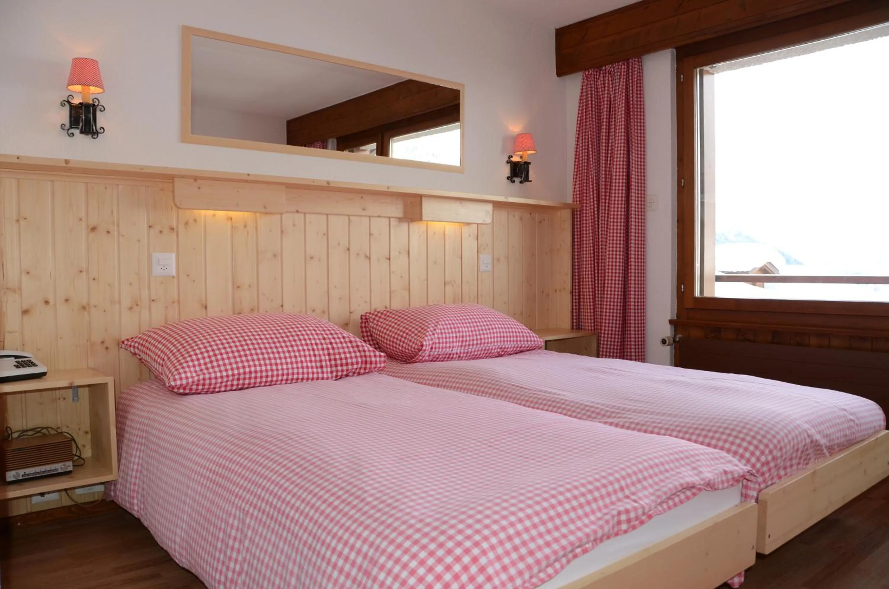 Bed in Hotel Mirabeau