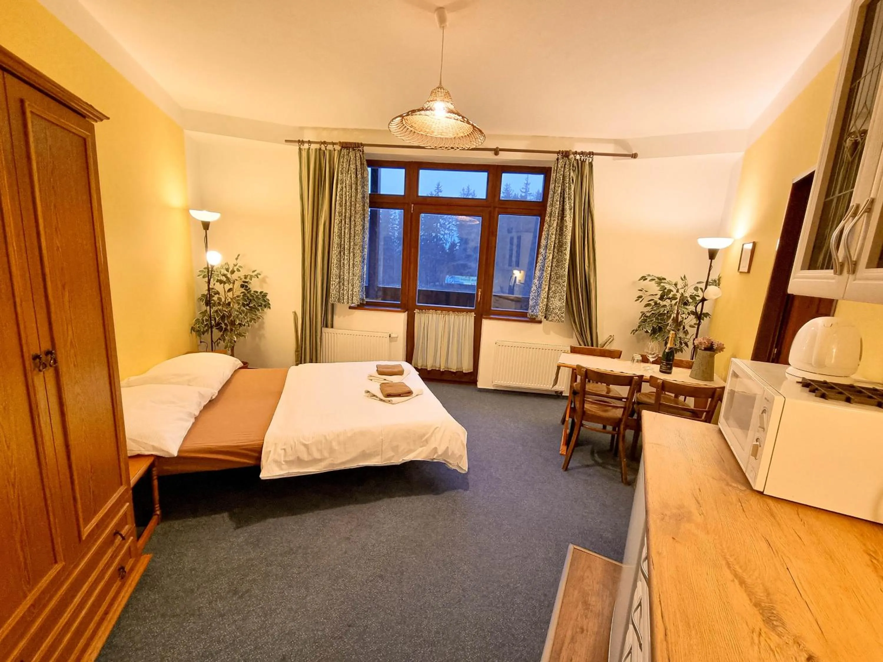 Kitchen or kitchenette, Bed in Penzion Rotunda