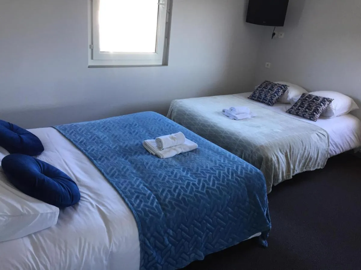 Comfort Quadruple Room in Hôtel du Parc