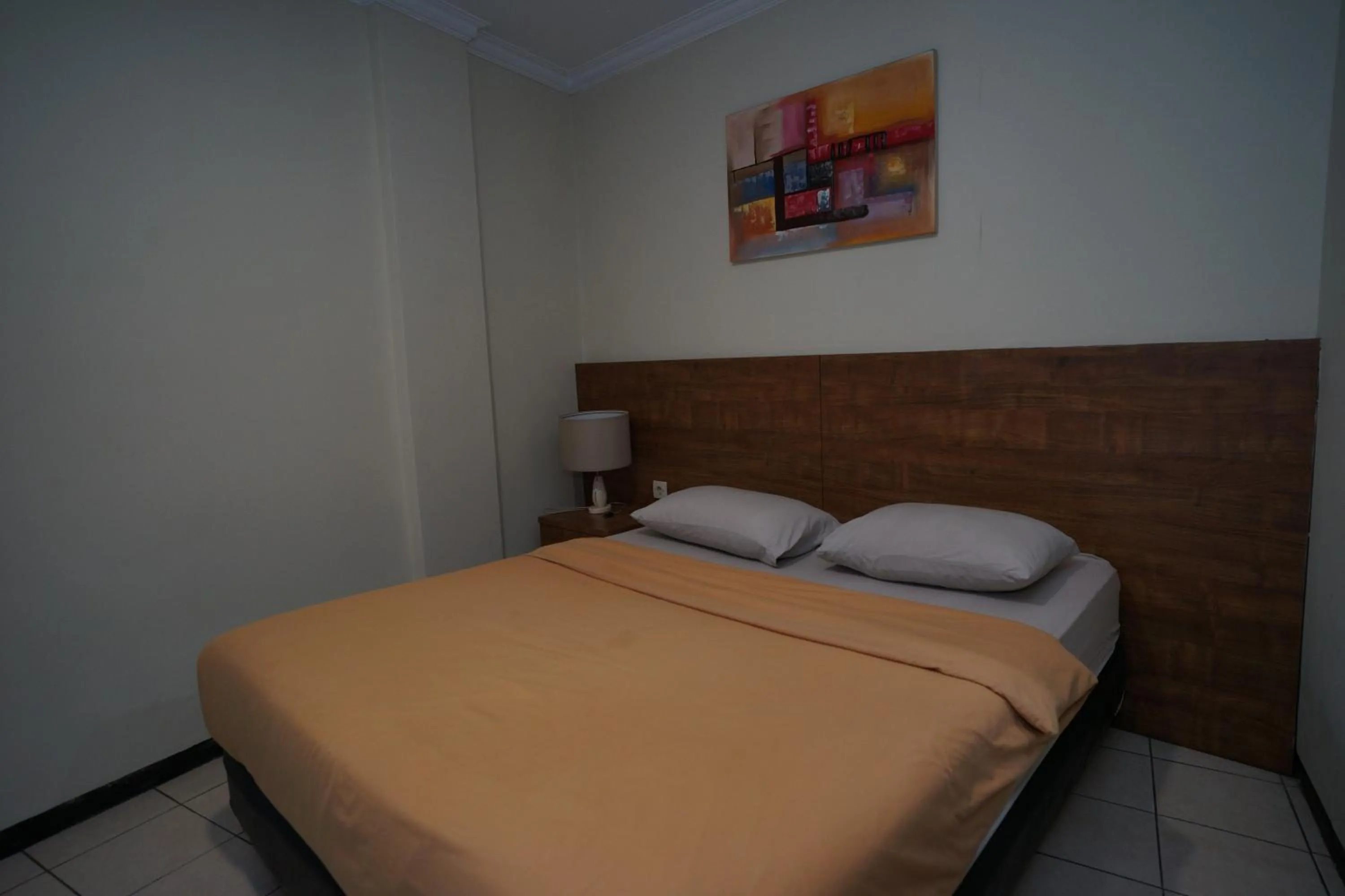 Bed in Hotel Puri Pangalengan