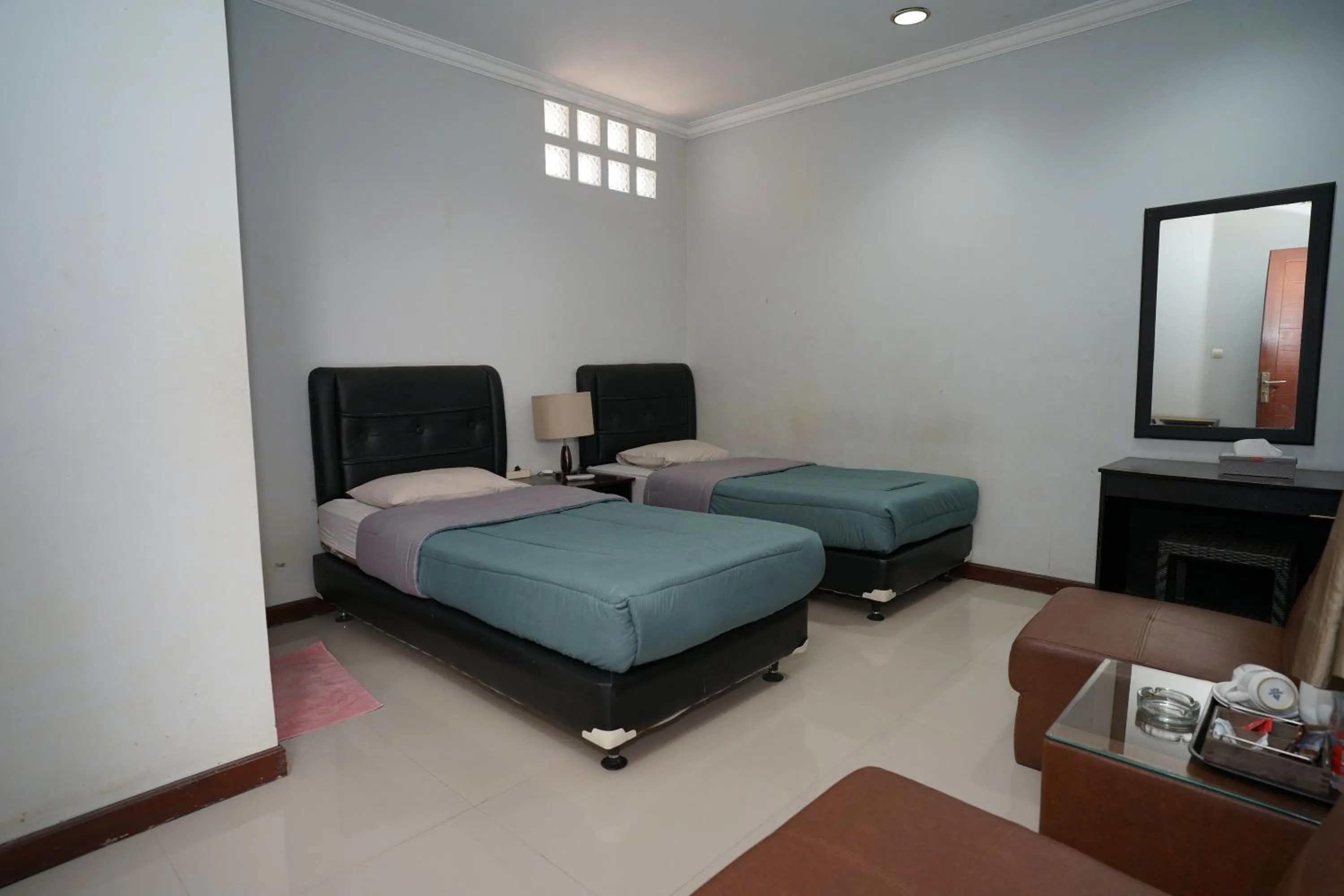 Bed in Hotel Puri Pangalengan