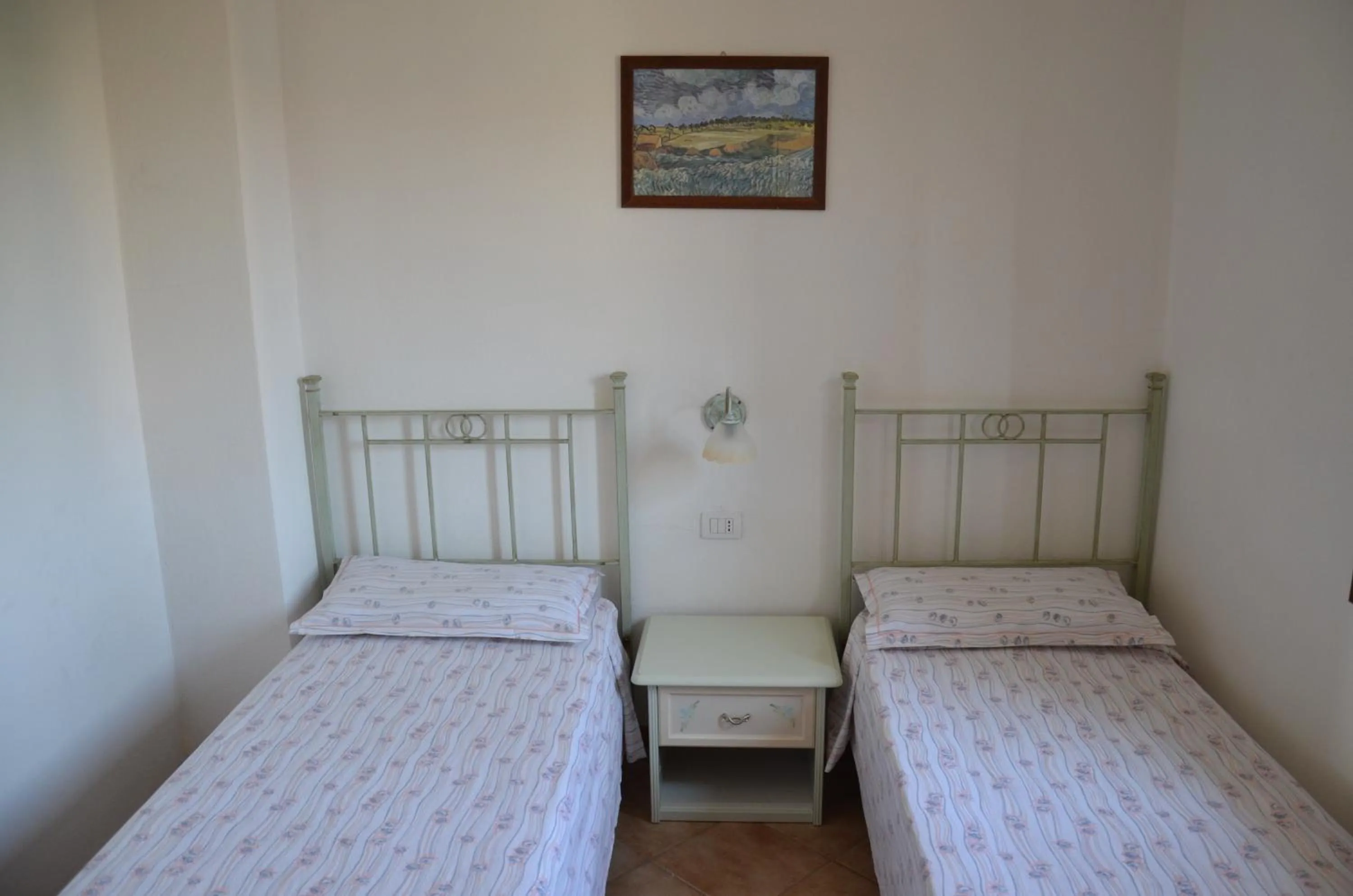 Bedroom in Residence Costa Del Turchese