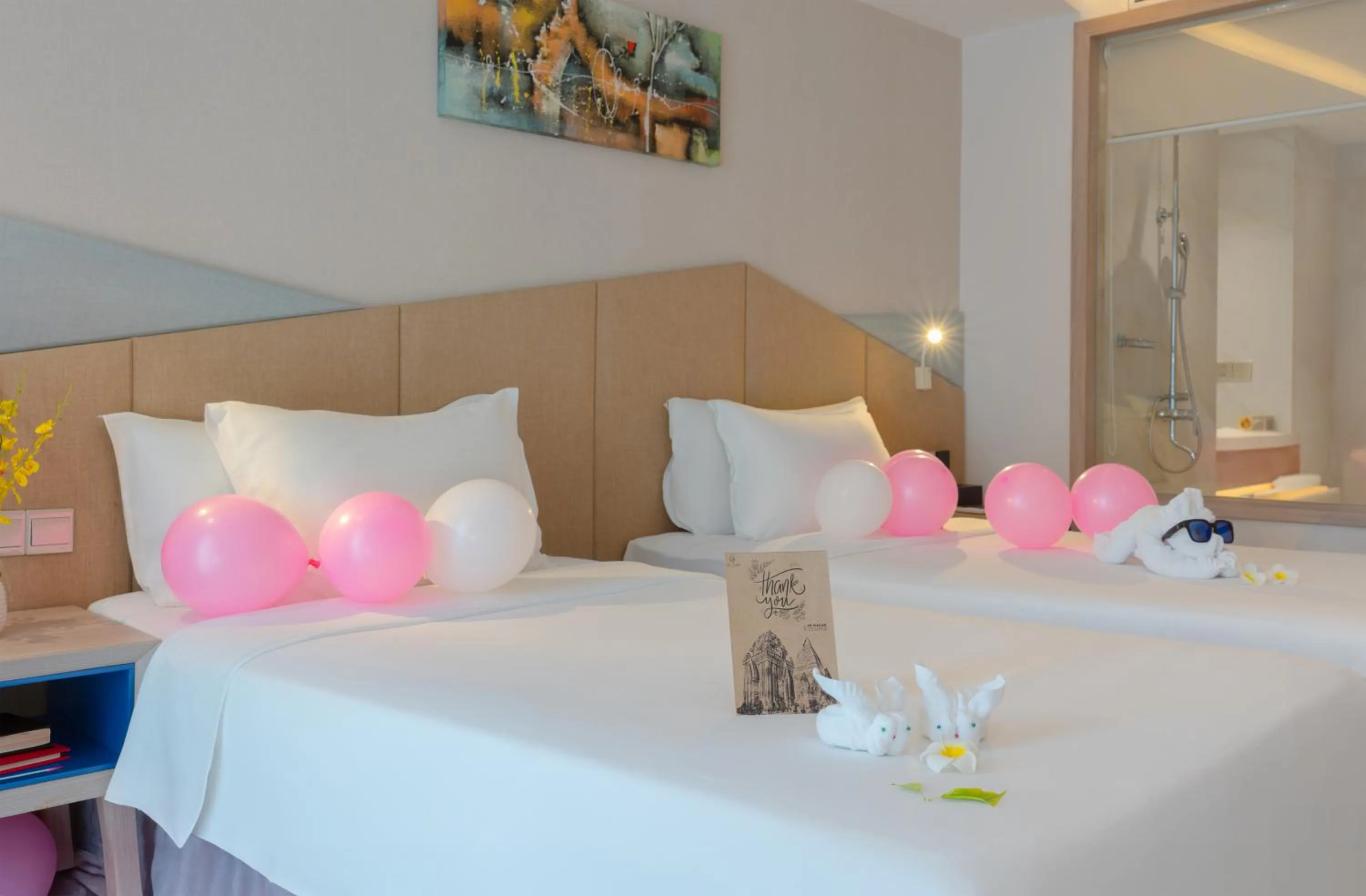 Bed in Le's Cham Hotel