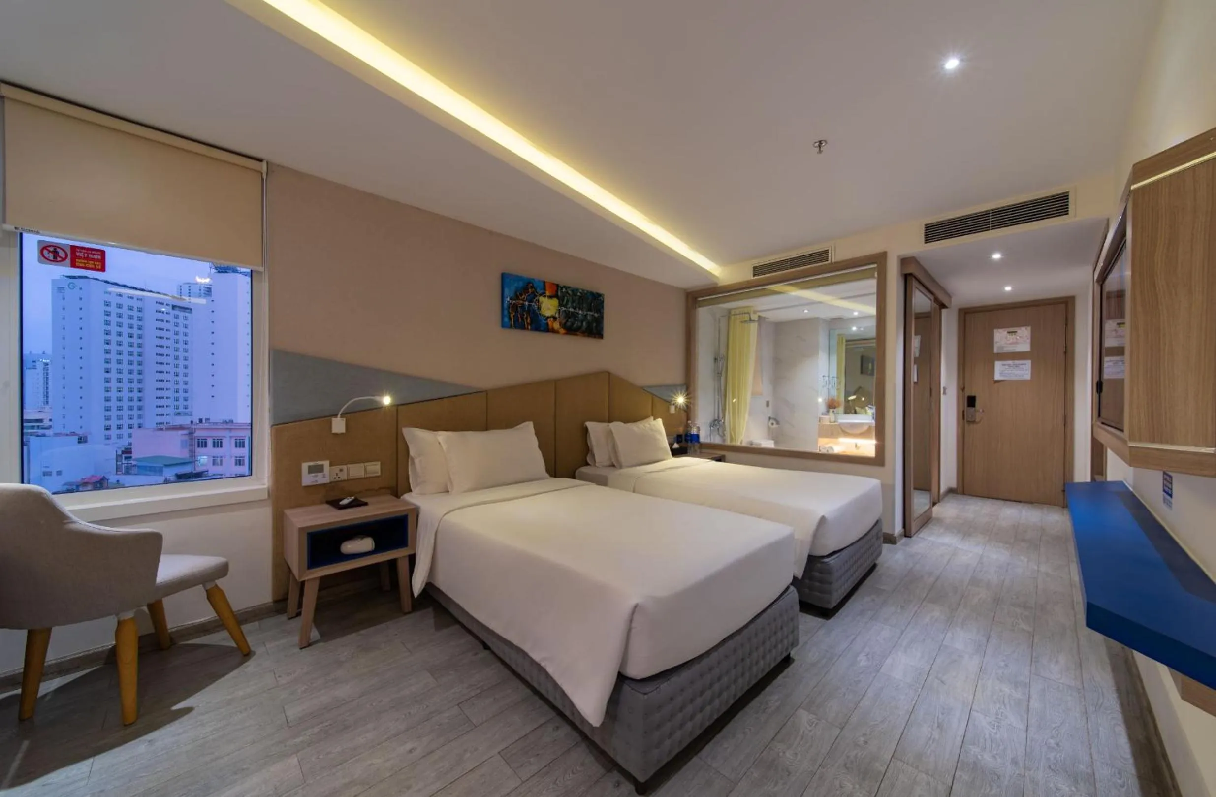 Bed in Le's Cham Hotel