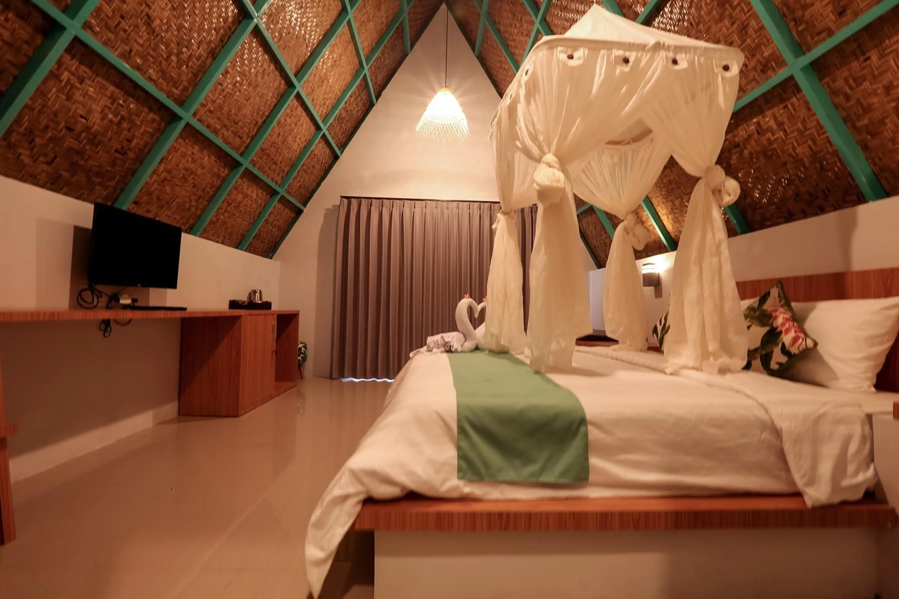 Bed in Makarma Resort Lombok