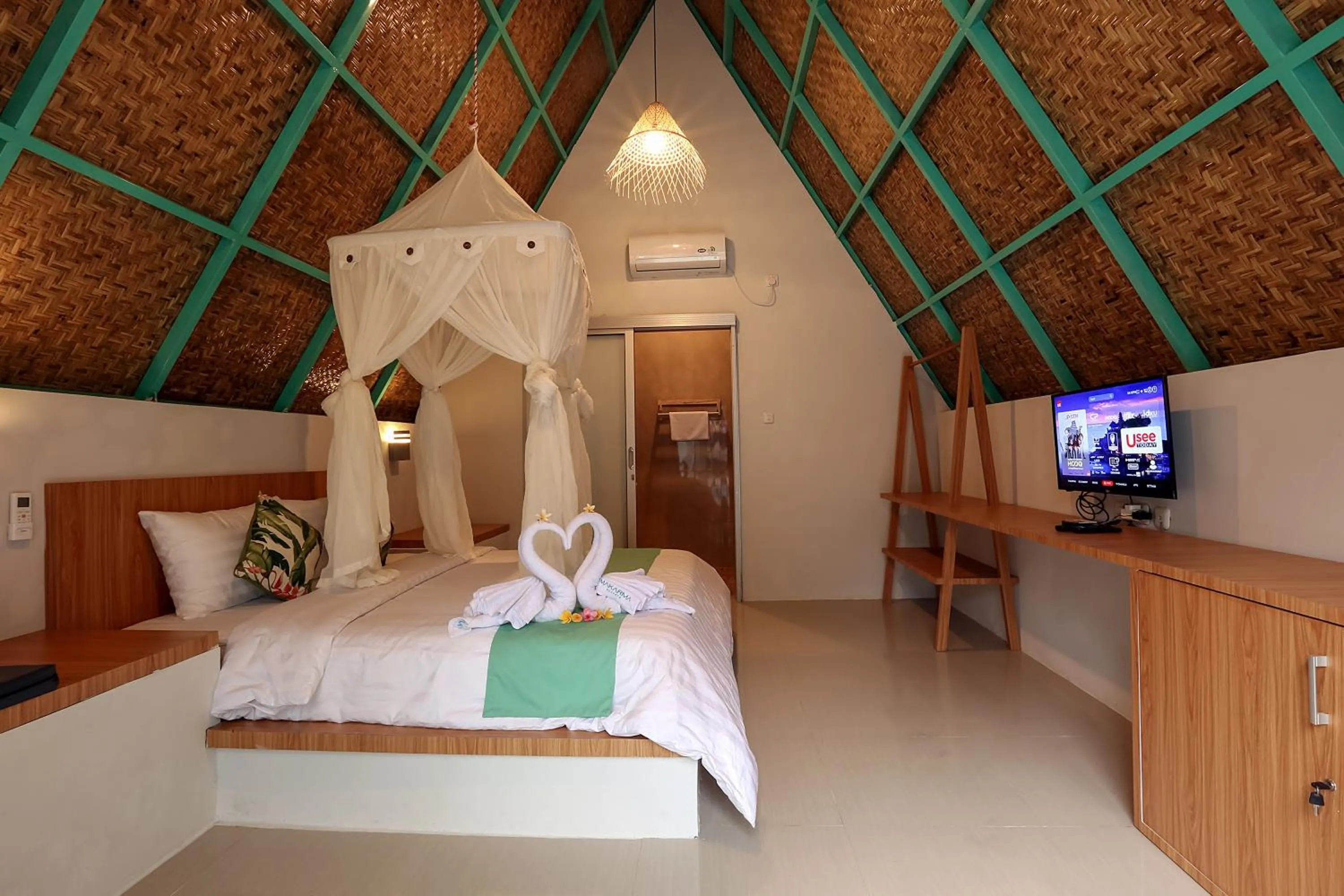 Bed in Makarma Resort Lombok