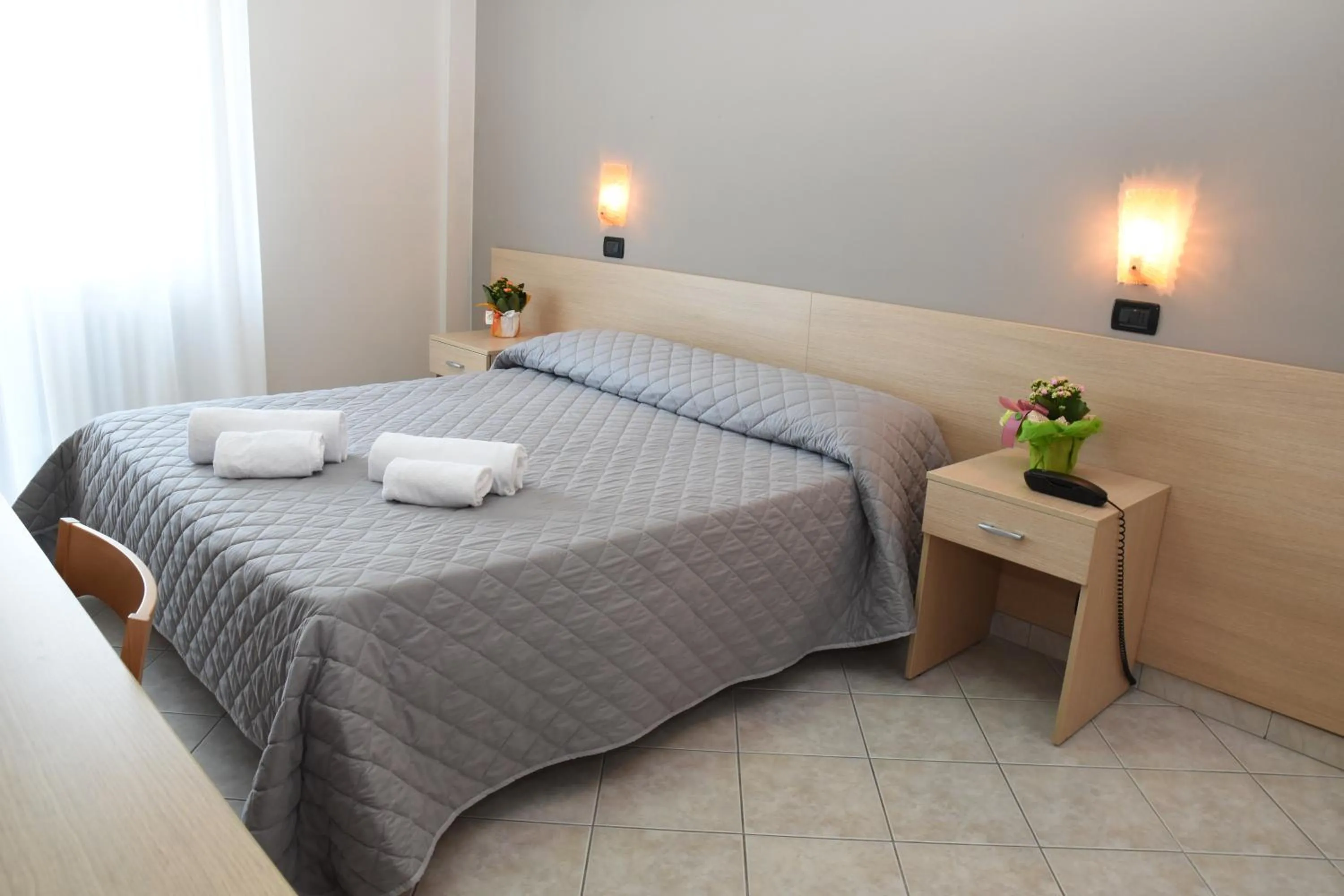 Bed in Hotel Excelsior