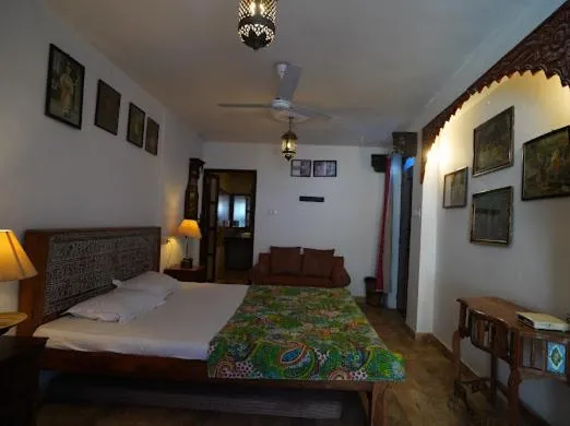 Bed in Yogis Guest House