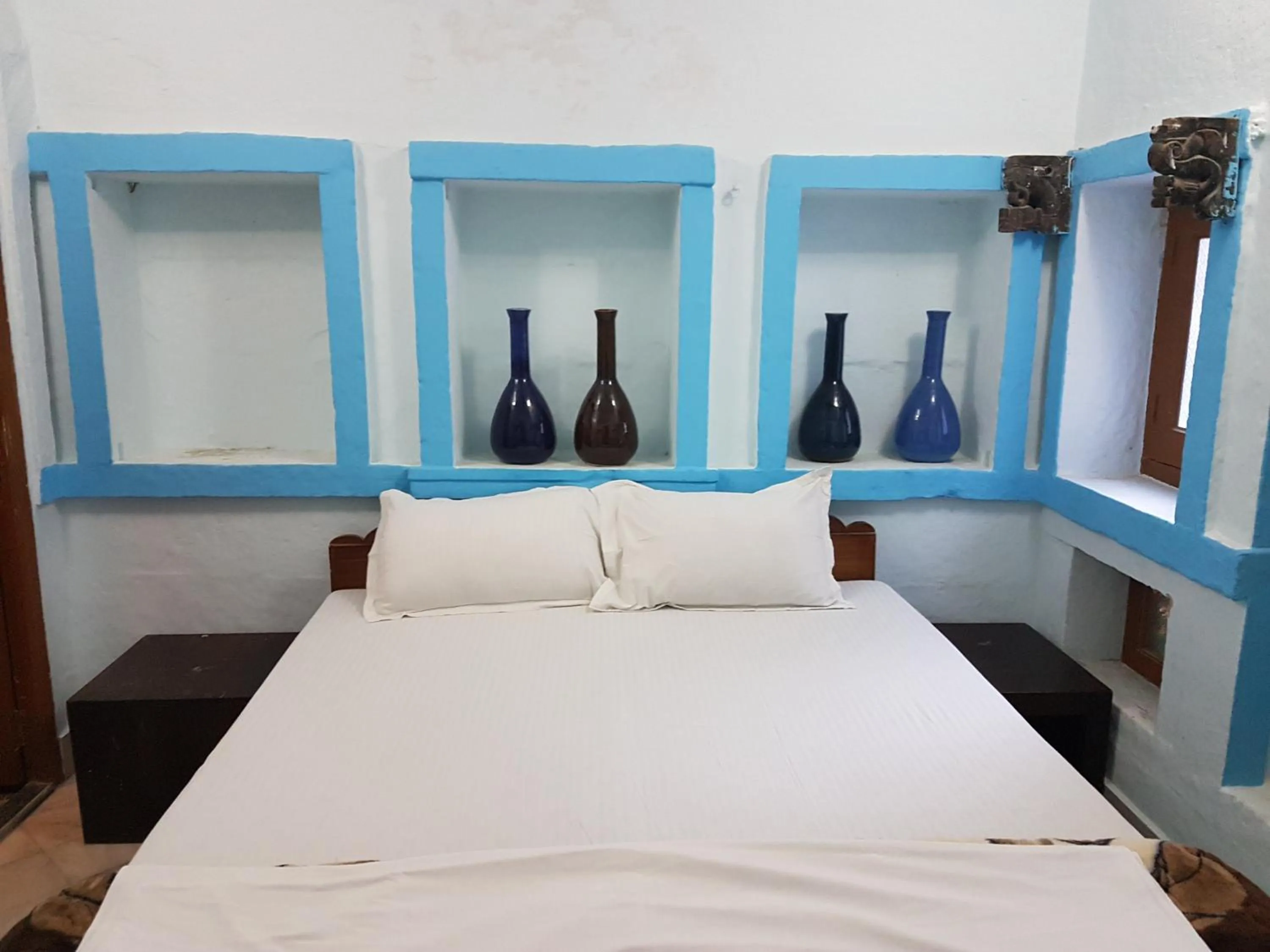 Photo of the whole room, Bed in Yogis Guest House