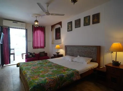 Bed in Yogis Guest House