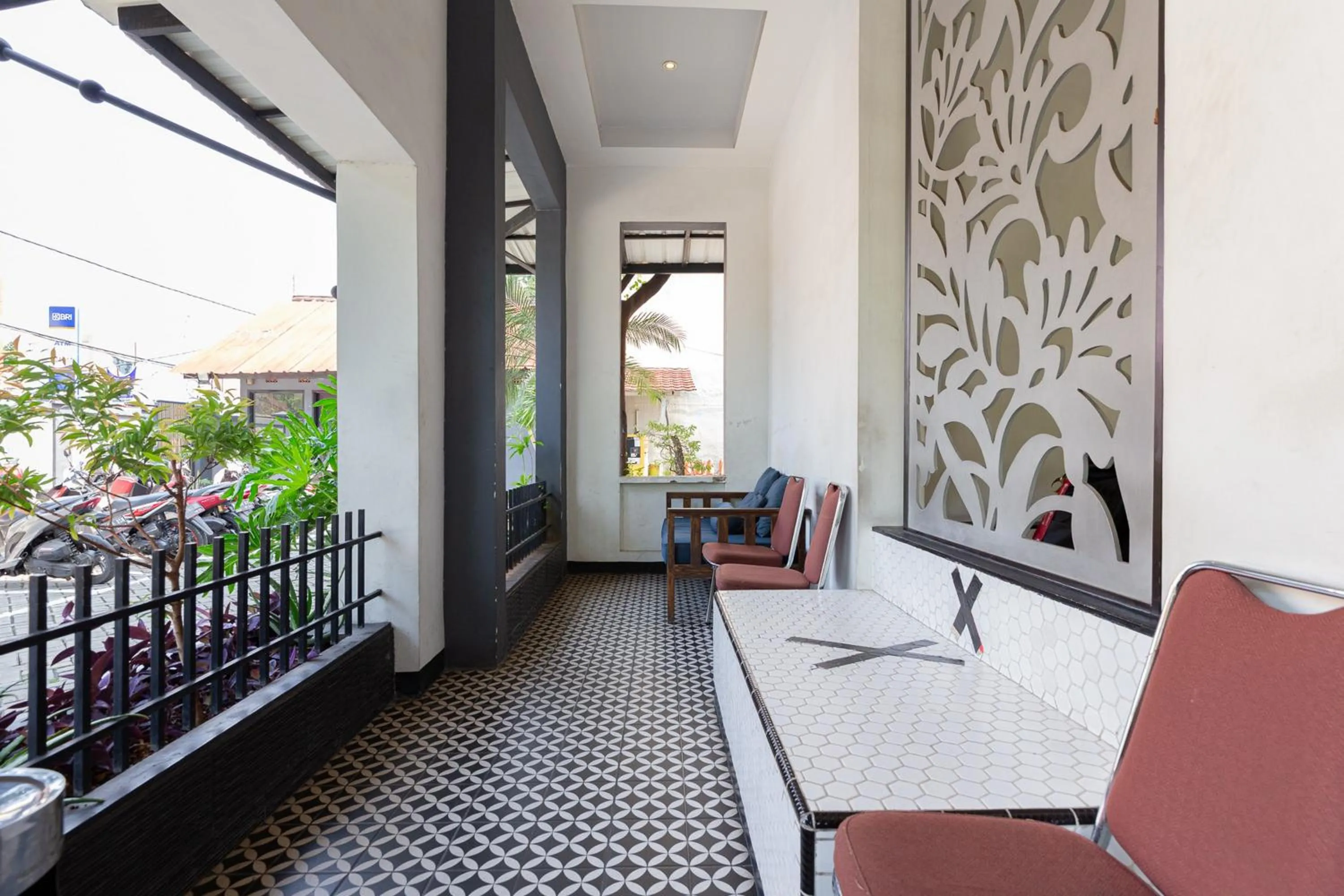 Seating area in RedDoorz Plus near Mall Slipi Jaya