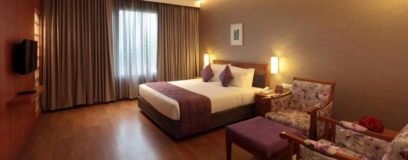 Bed in Monsoon Empress Kochi