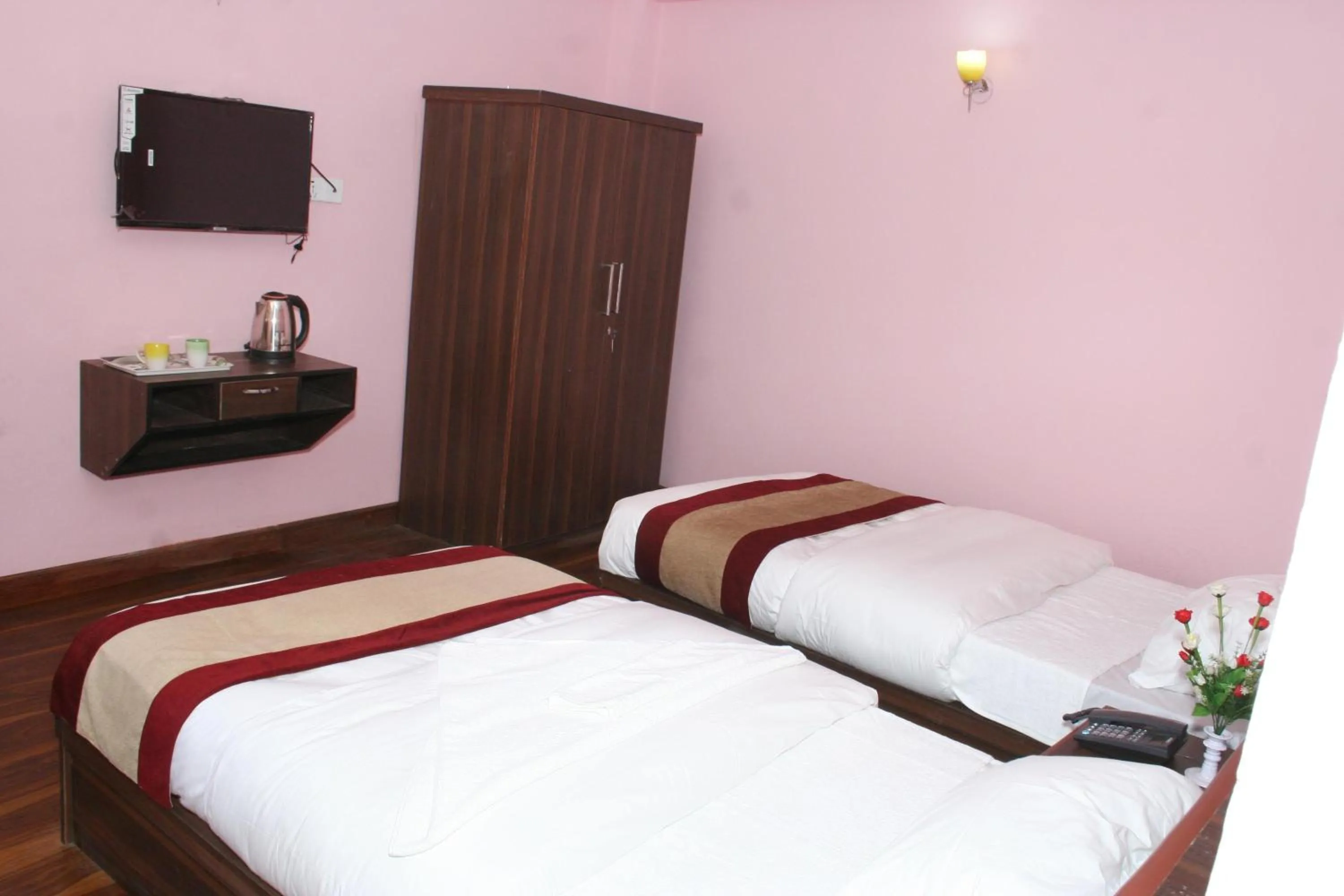 Bed in Sitapaila Home Stay and Apartment