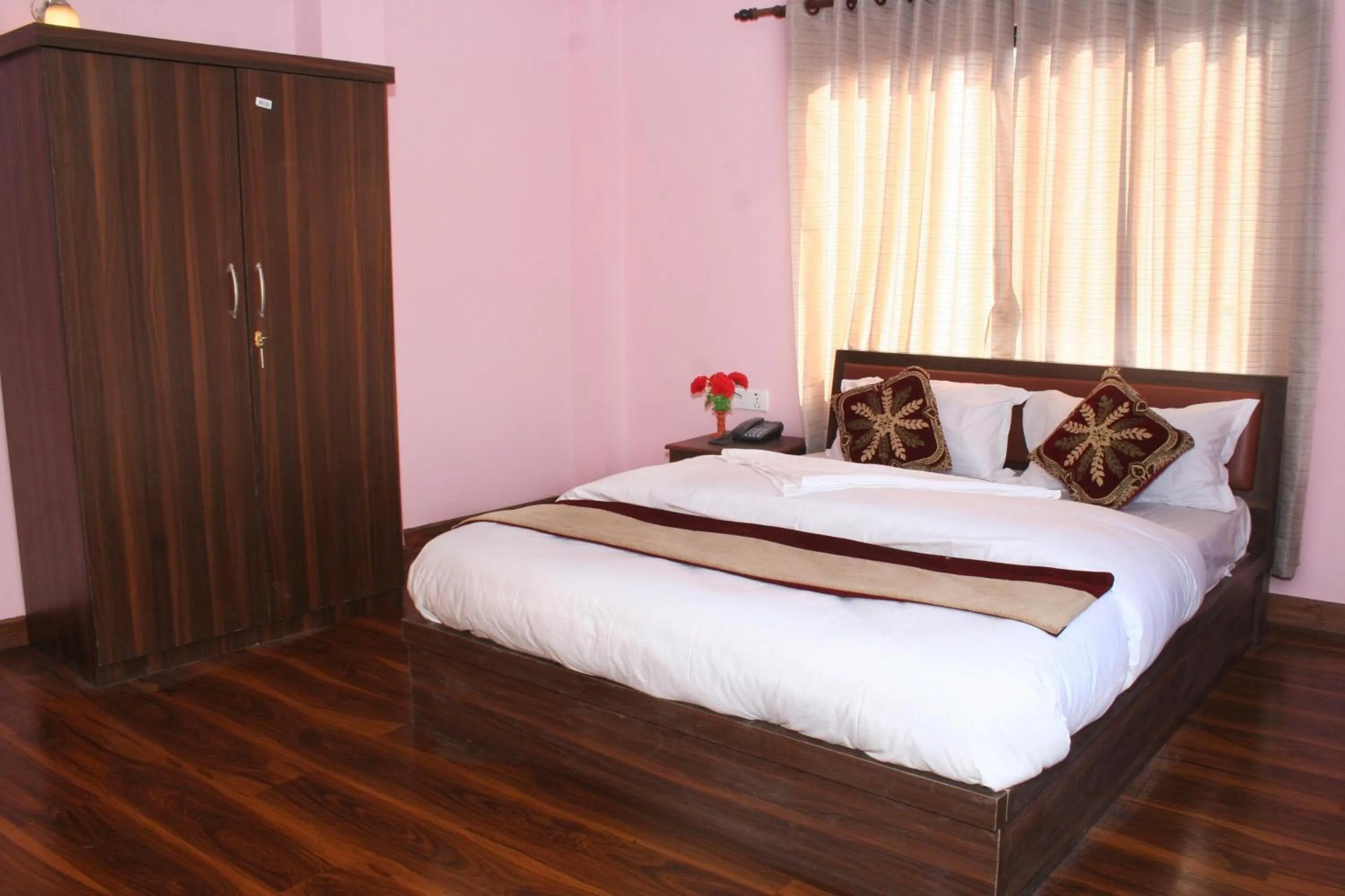 Bed in Sitapaila Home Stay and Apartment