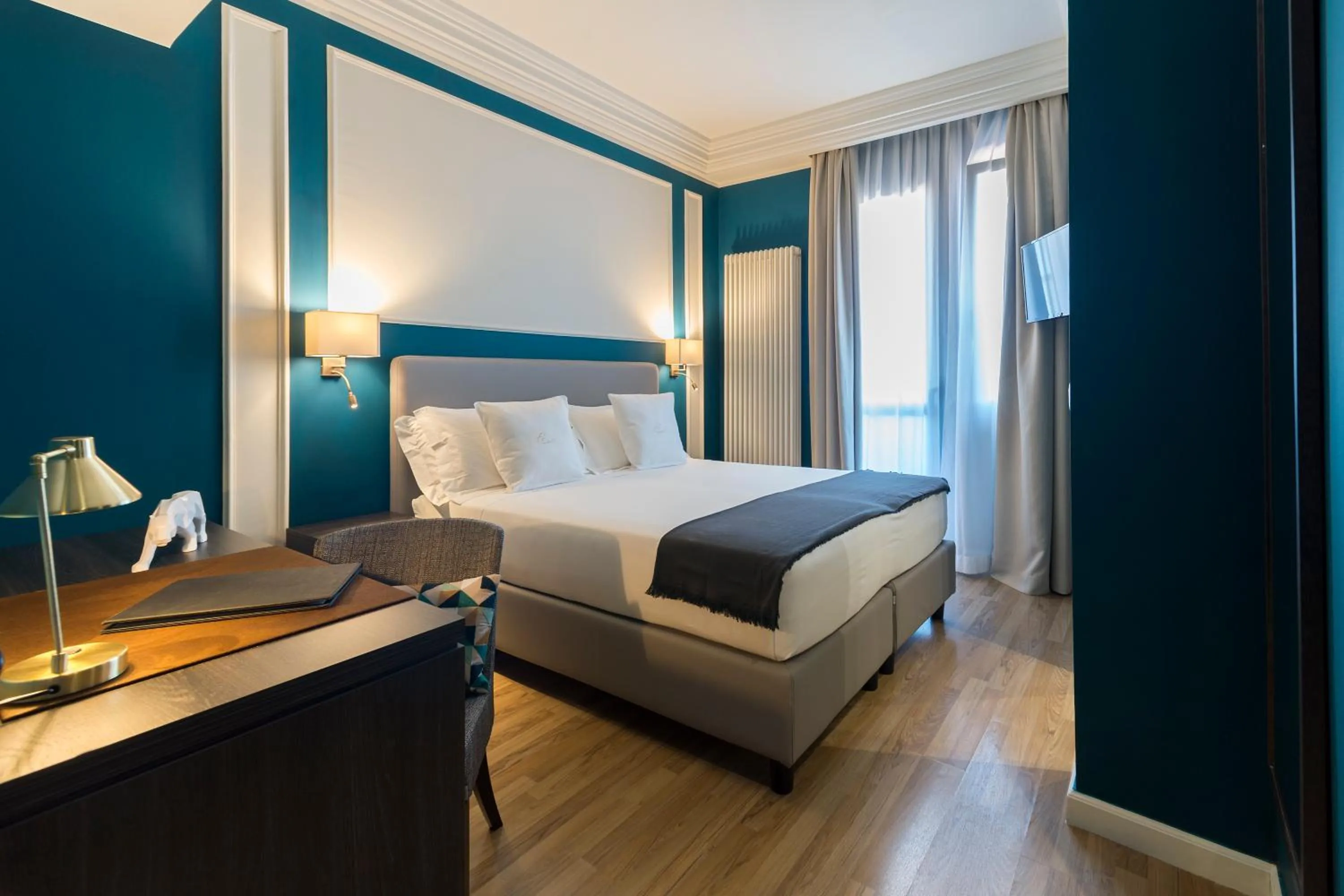 Bed in Elizabeth Lifestyle Hotel