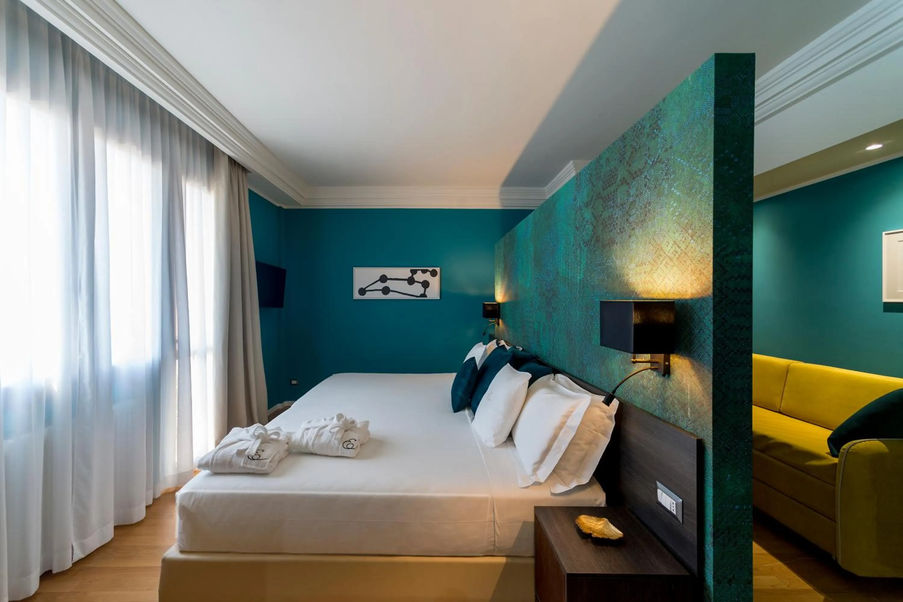 Bed in Elizabeth Lifestyle Hotel