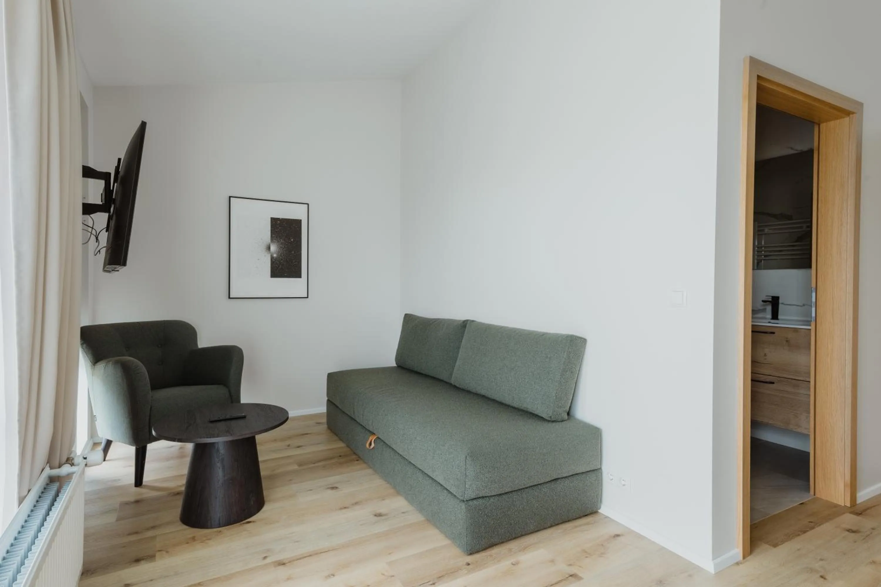 Communal lounge/ TV room in Hótel Eldhestar