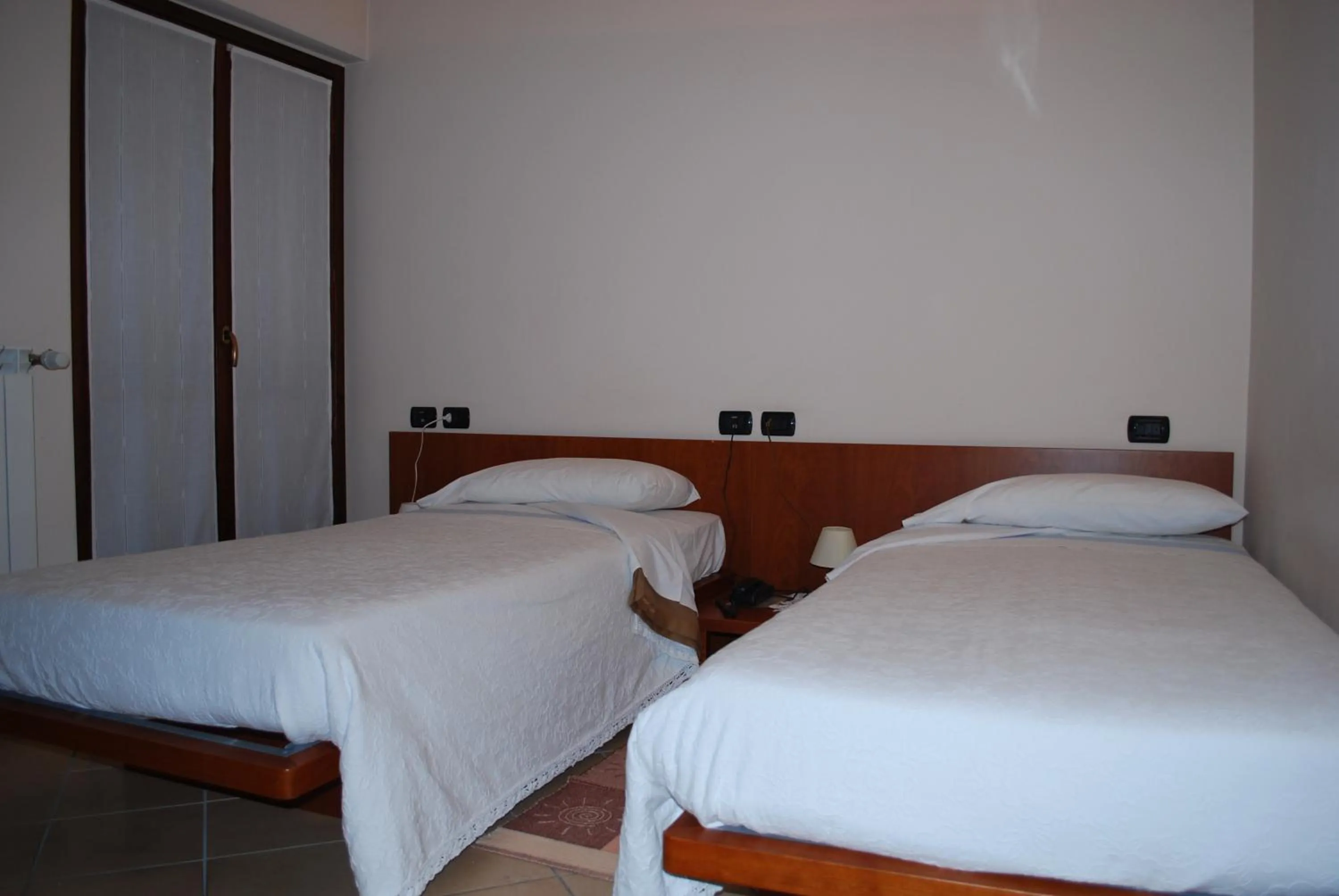 Bed in Albergo Sole