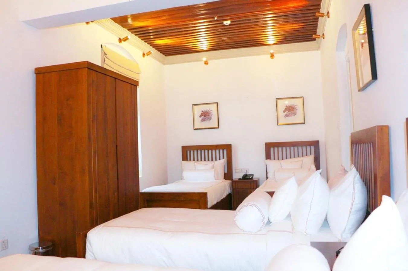 Bed in The Clovelly Bungalow