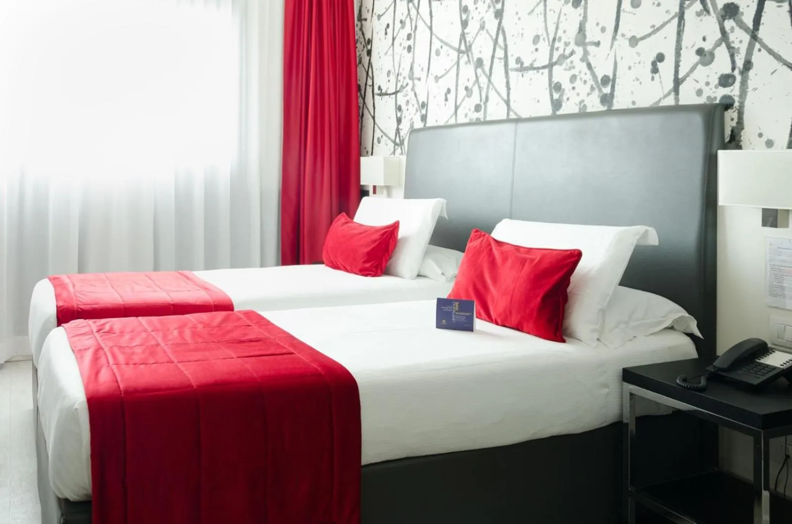 Bed in Hotel American Palace Eur