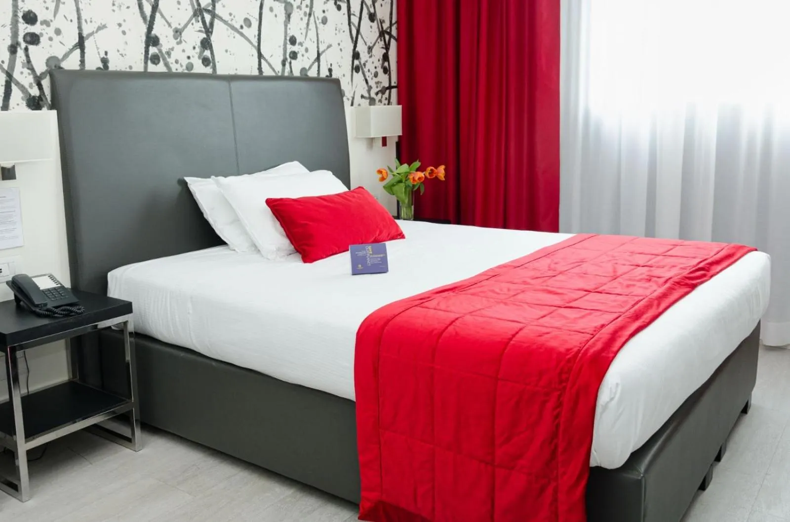 Bed in Hotel American Palace Eur