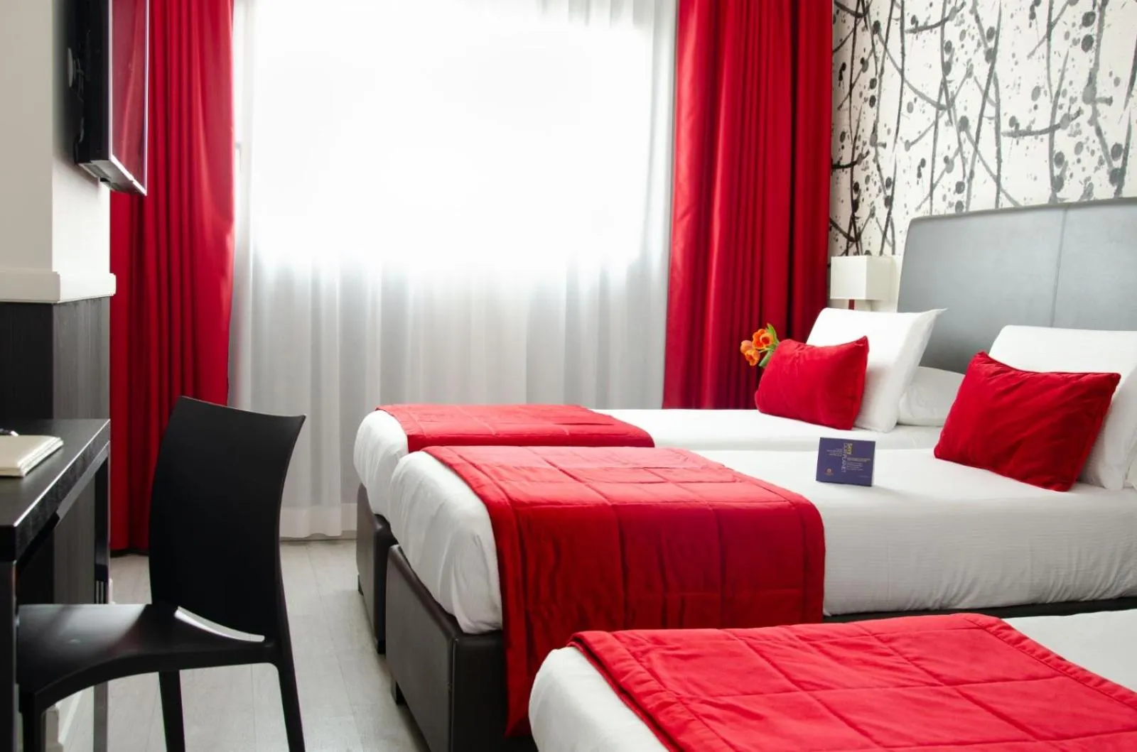 Bed in Hotel American Palace Eur