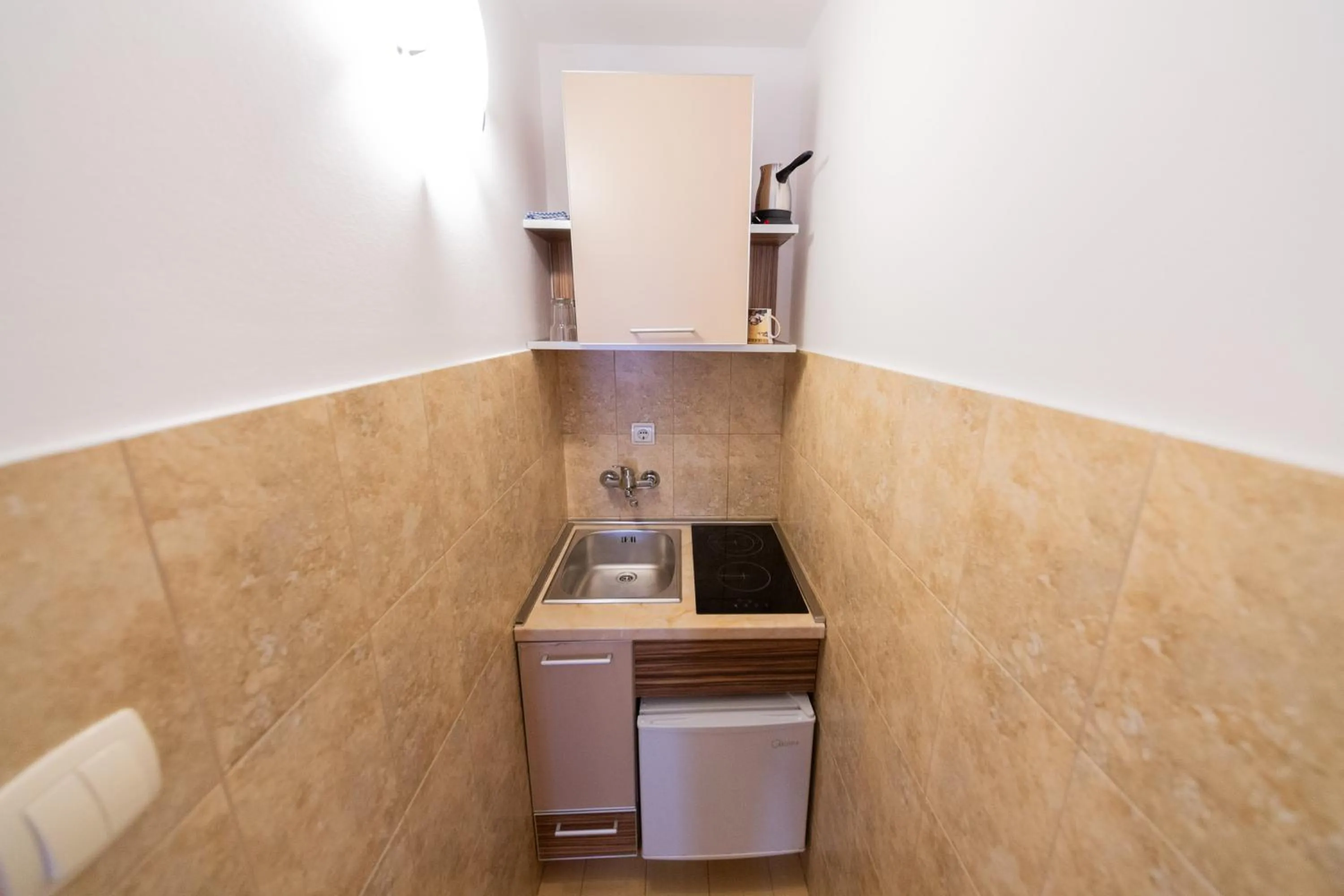 kitchen in Azzuro apartments Budva