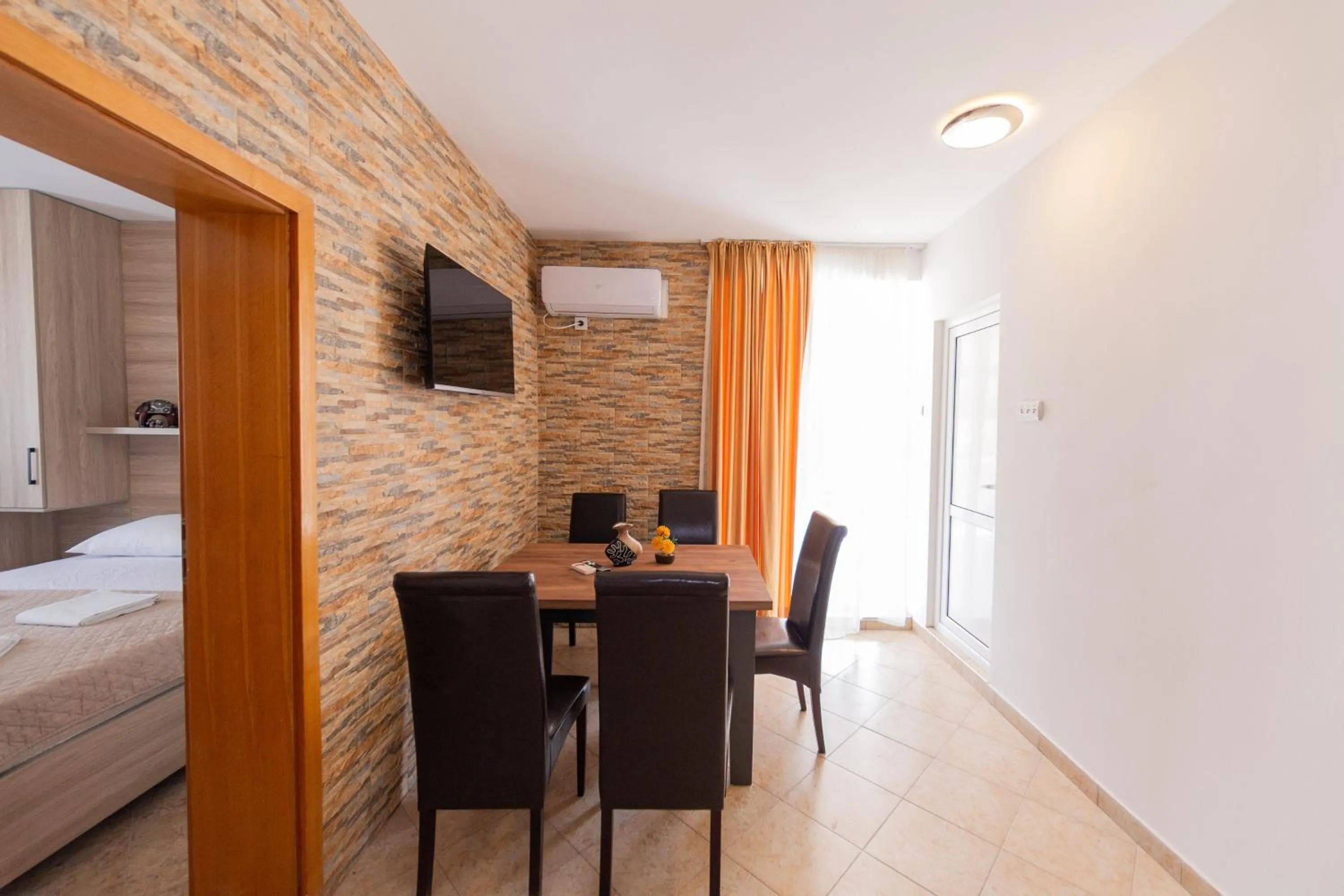 Dining area, Bed in Azzuro apartments Budva