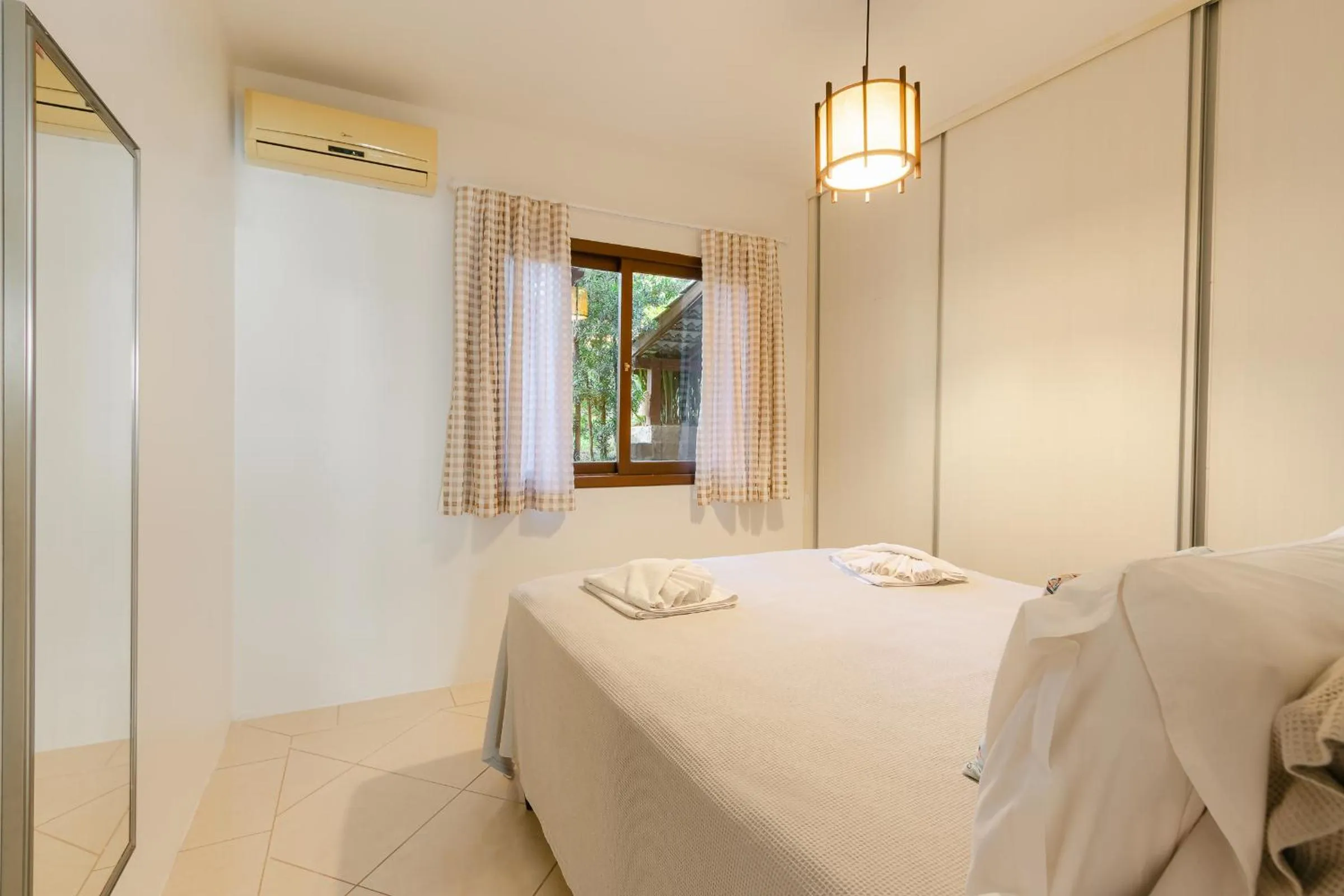 Bed in Pousada Areias do Rosa