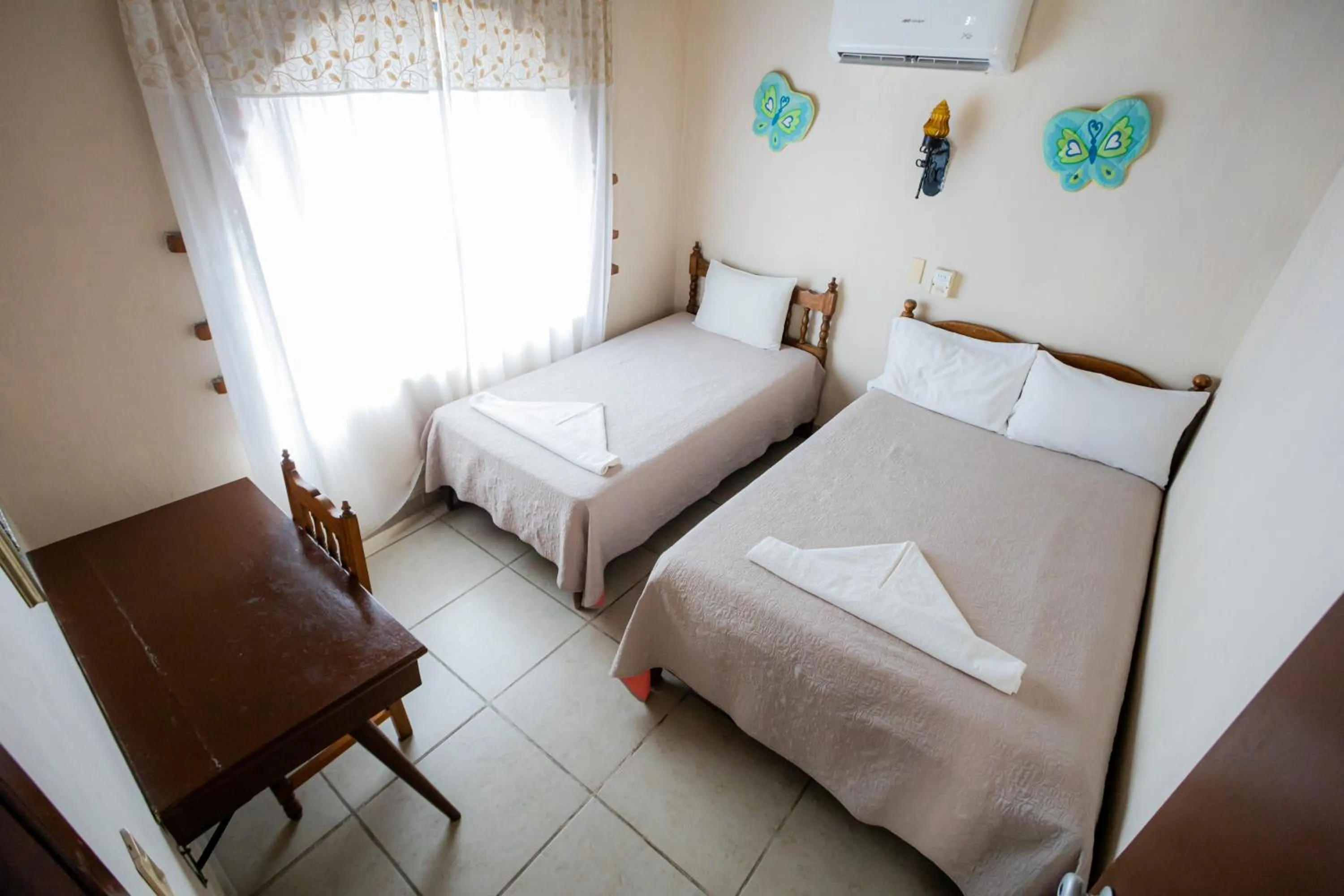 Bed in Bungalows Maria Teresa