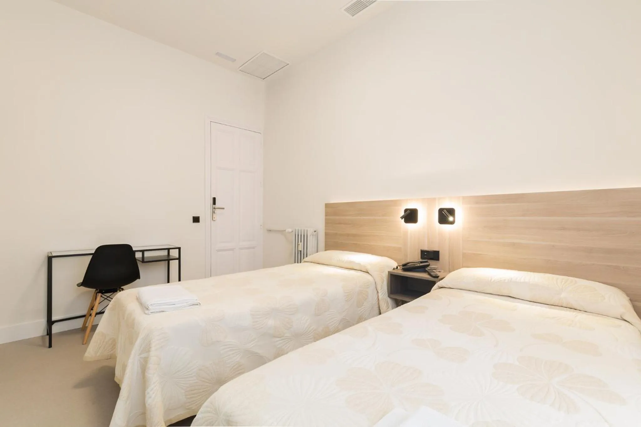 Bed in Hostal Excelsior