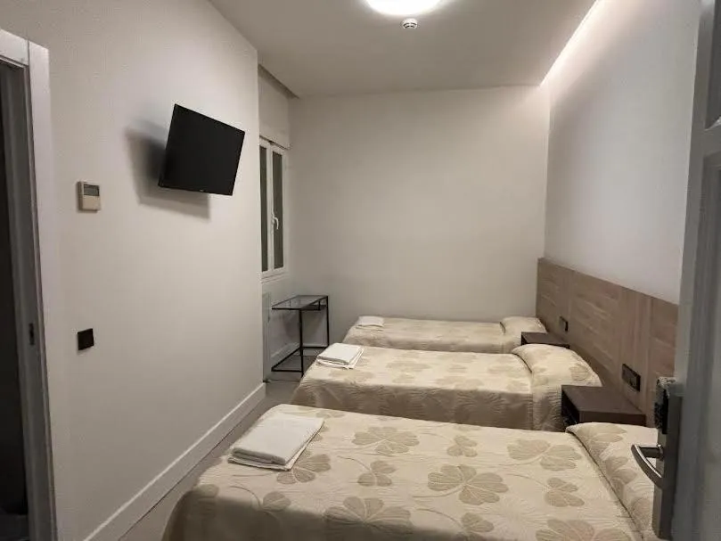 Bed in Hostal Excelsior