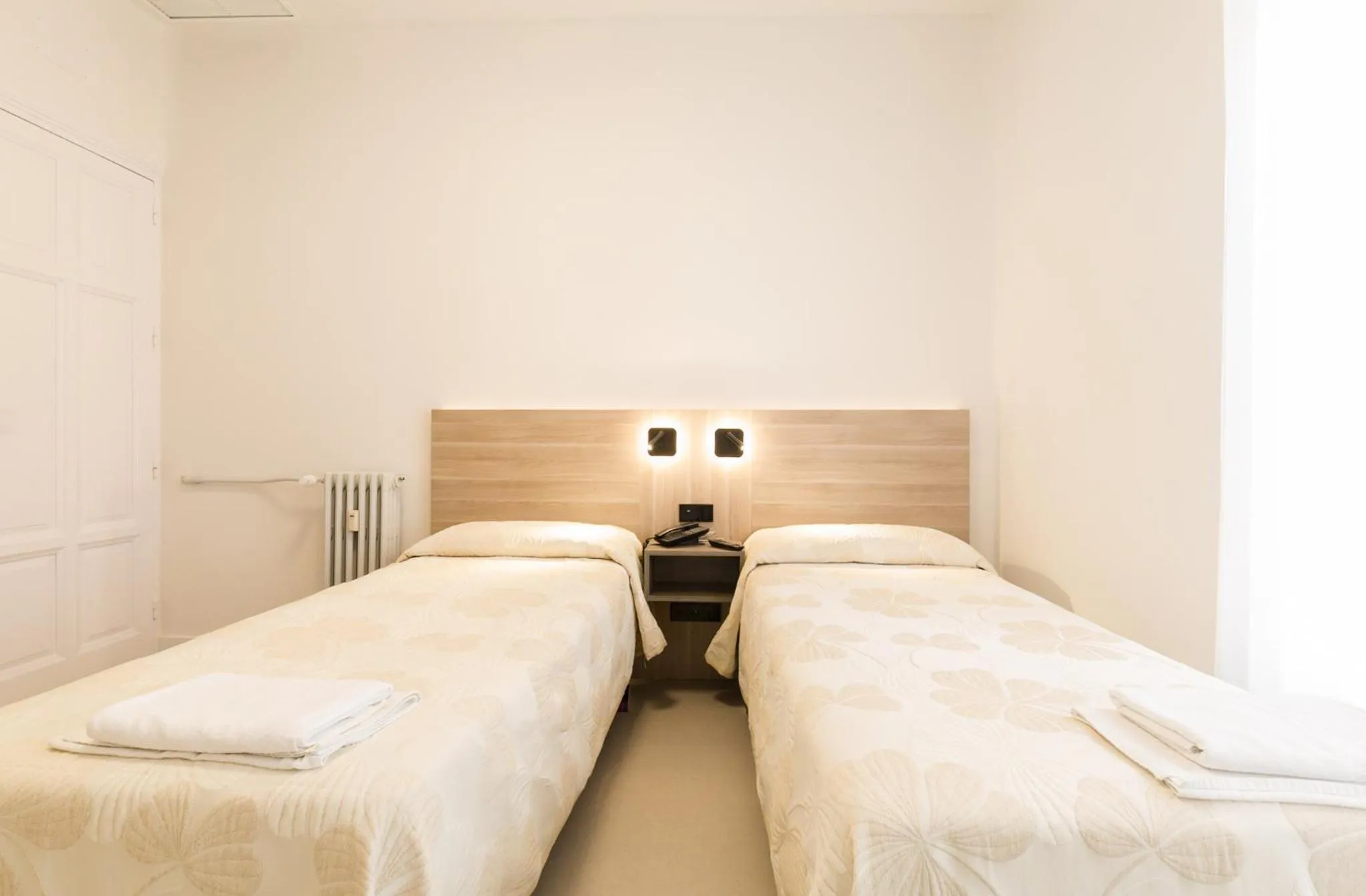 Bed in Hostal Excelsior